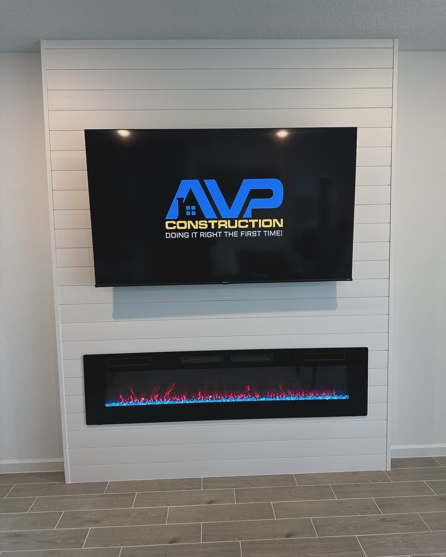 Slat-wall TV feature with hidden wiring by AVP Construction JAX — Jacksonville & St. John's County, FL