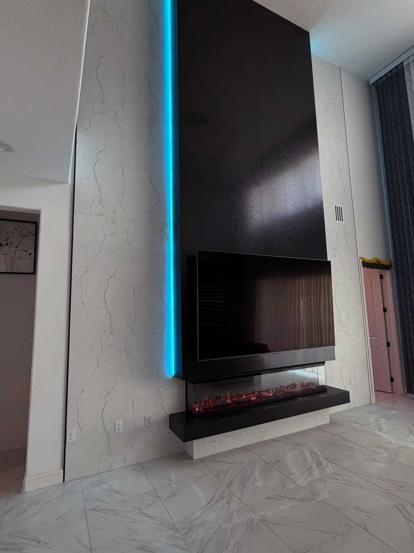 Floating-shelf TV built-in with shaker cabinets by AVP Construction JAX — Jacksonville & St. John's County, FL