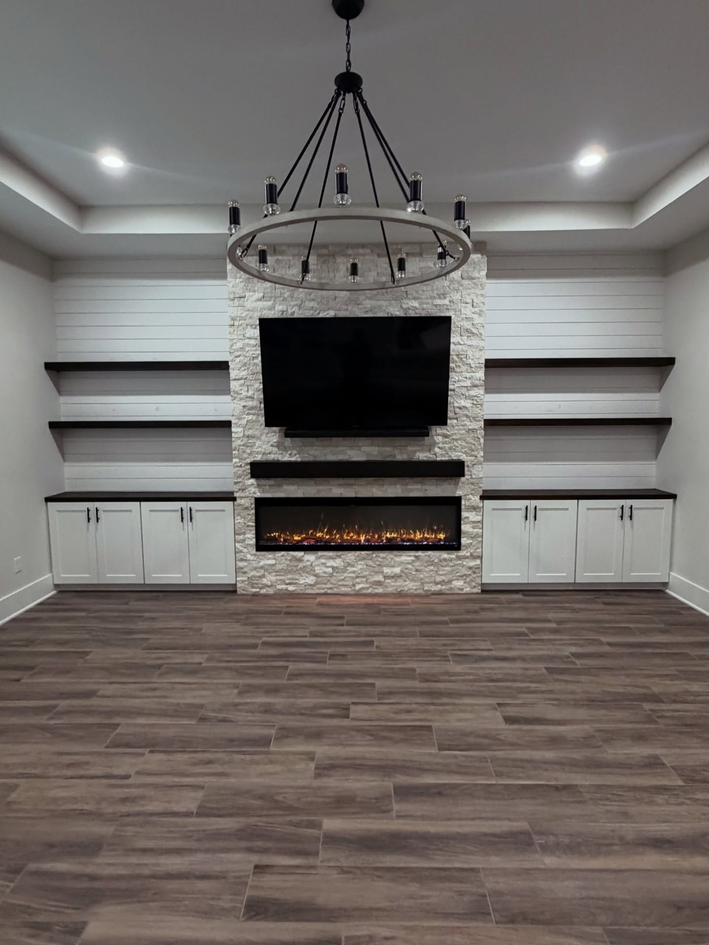 Custom living-room media wall with paneling by AVP Construction JAX — Jacksonville & St. John's County, FL