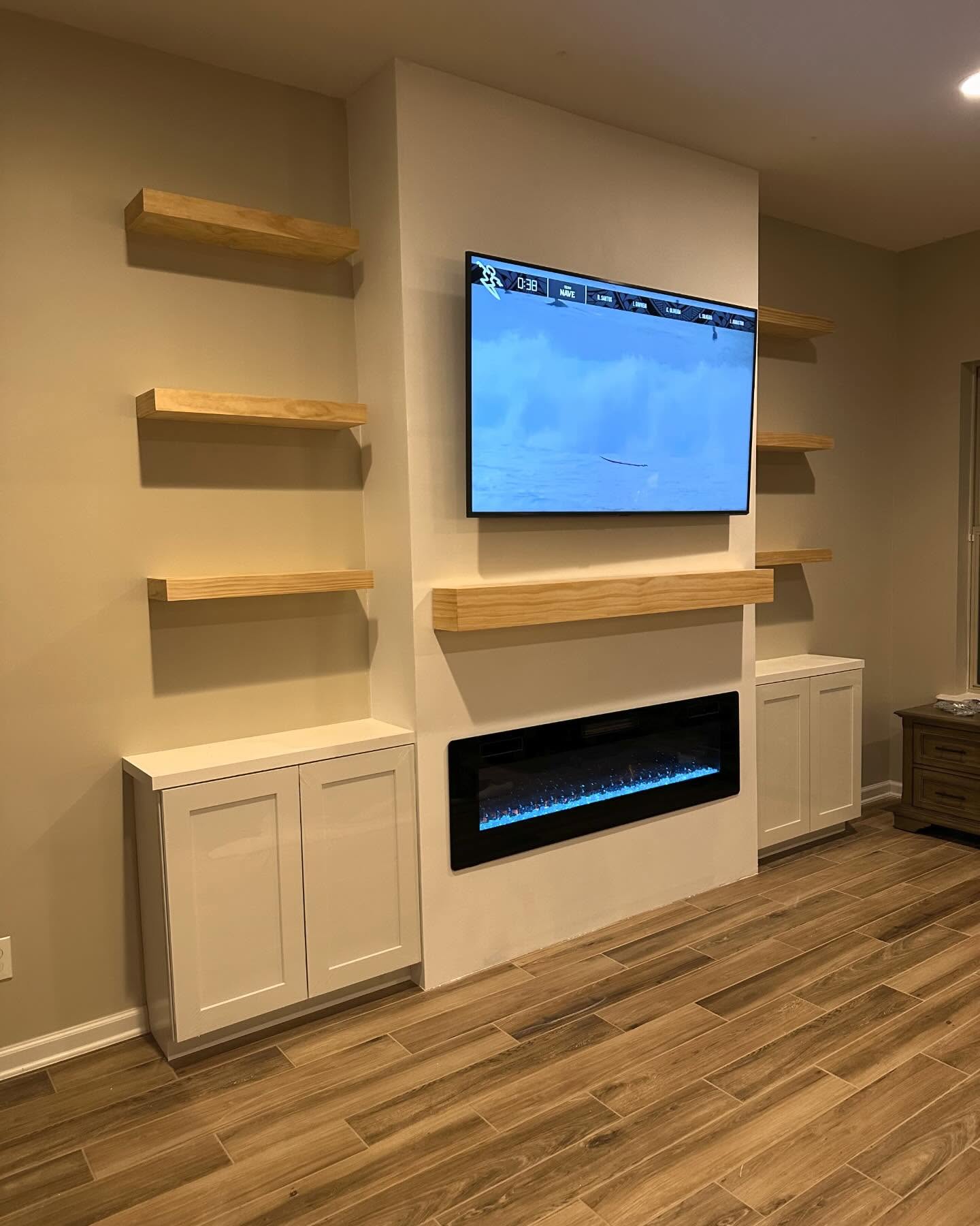 Custom TV entertainment center built-in by AVP Construction JAX — Jacksonville & St. John's County, FL