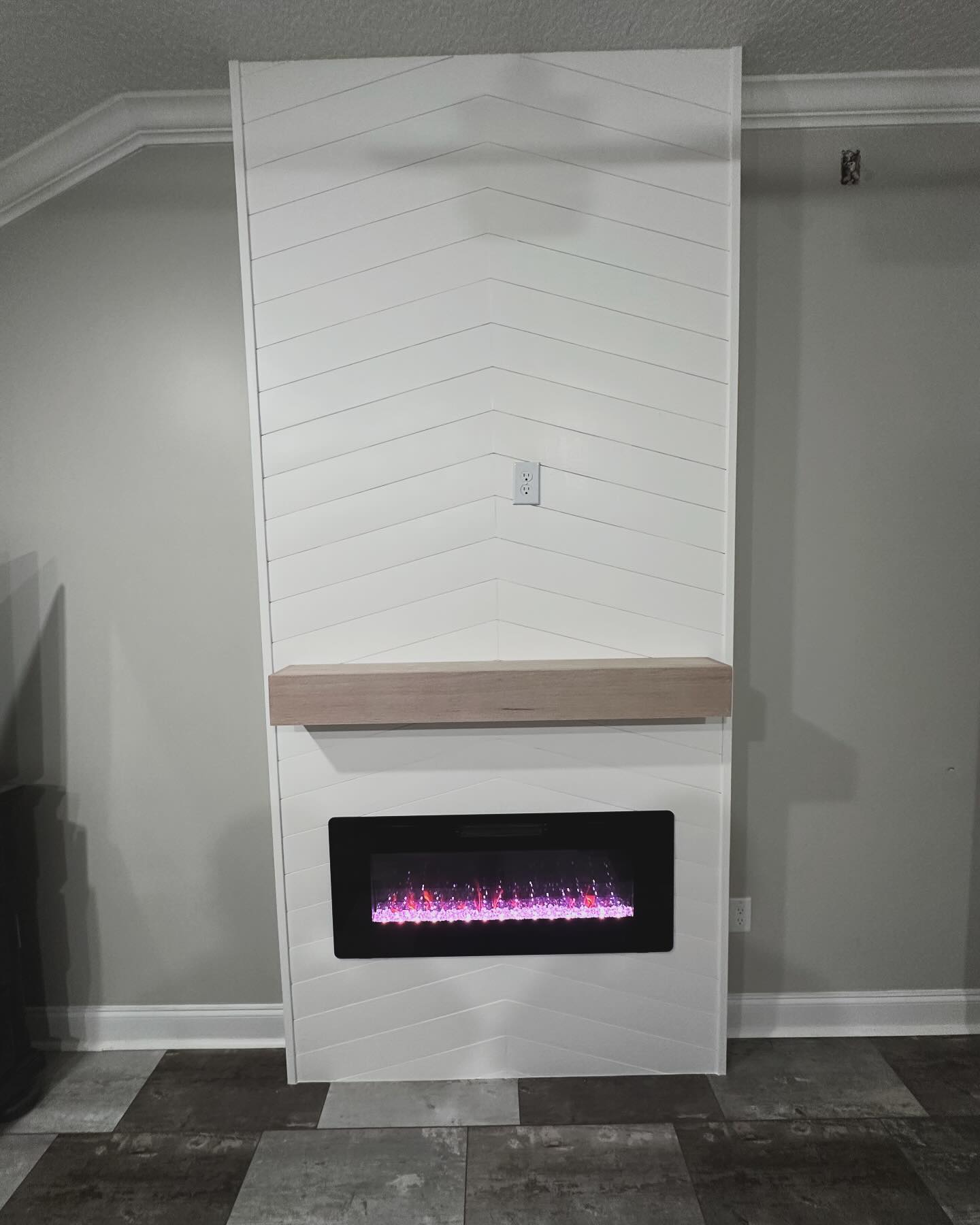 Custom living-room media wall with paneling by AVP Construction JAX — Jacksonville & St. John's County, FL