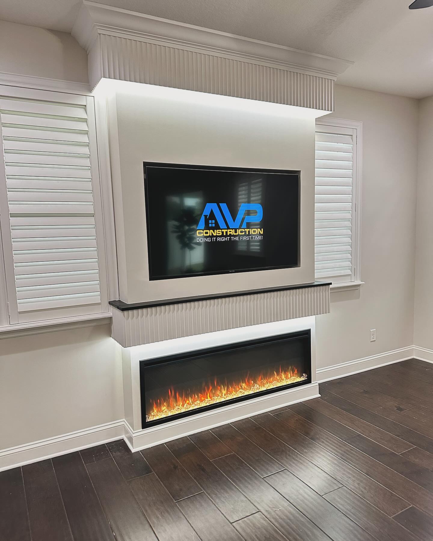Slat-wall TV feature with hidden wiring by AVP Construction JAX — Jacksonville & St. John's County, FL