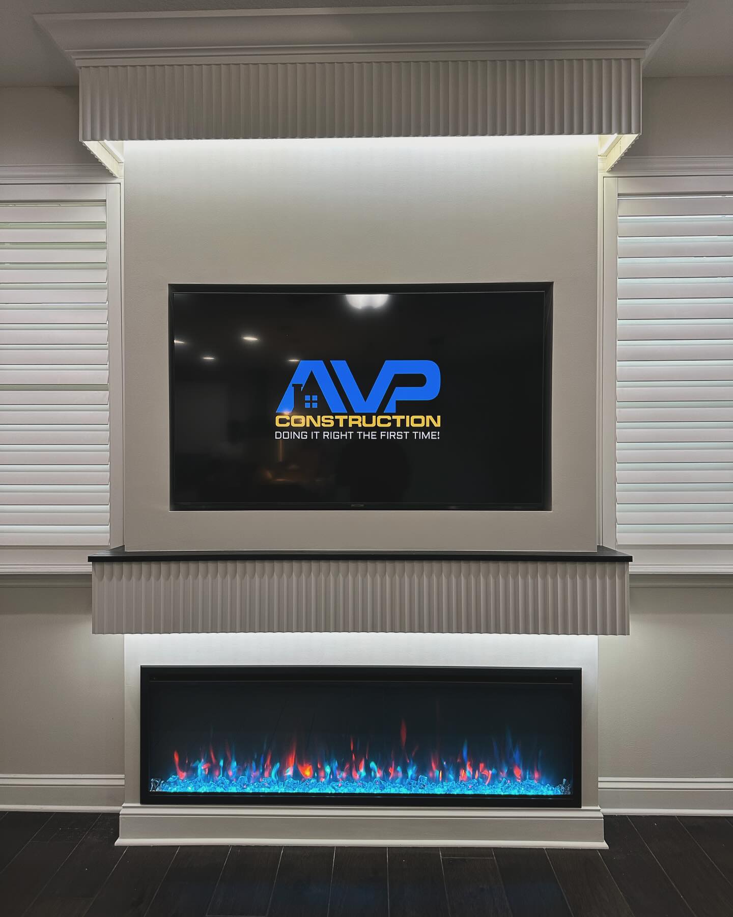 Slat-wall TV feature with hidden wiring by AVP Construction JAX — Jacksonville & St. John's County, FL