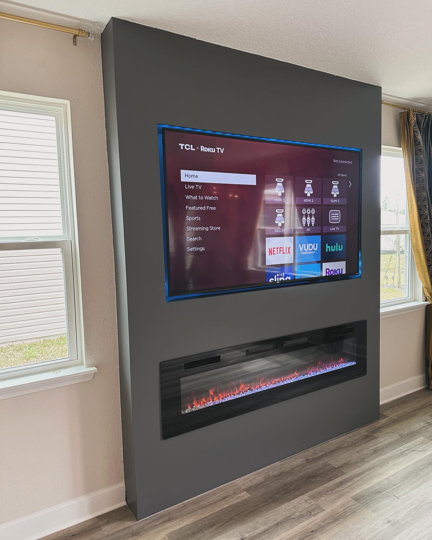 Custom TV entertainment center built-in by AVP Construction JAX — Jacksonville & St. John's County, FL