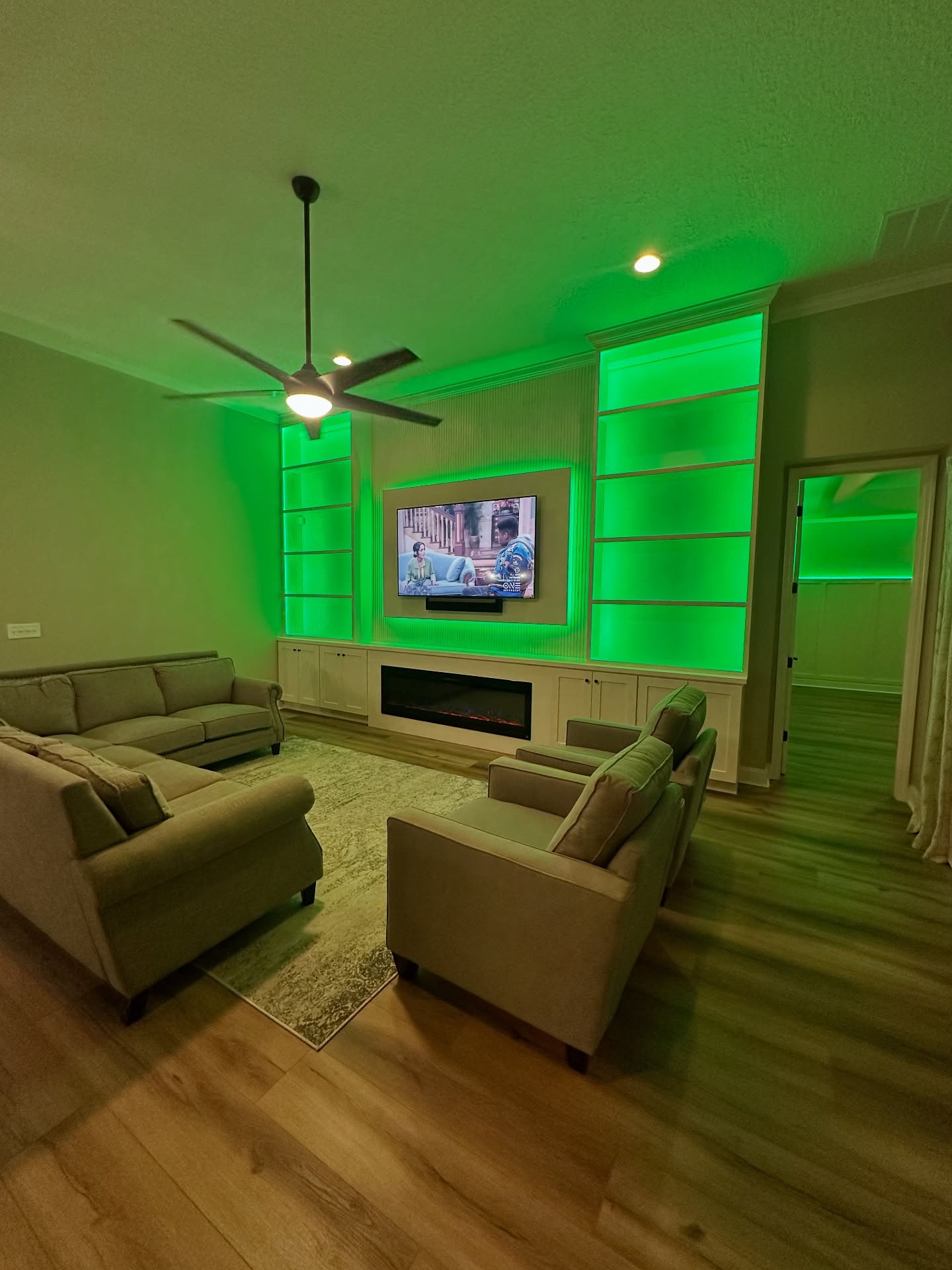 Custom living-room media wall with paneling by AVP Construction JAX — Jacksonville & St. John's County, FL