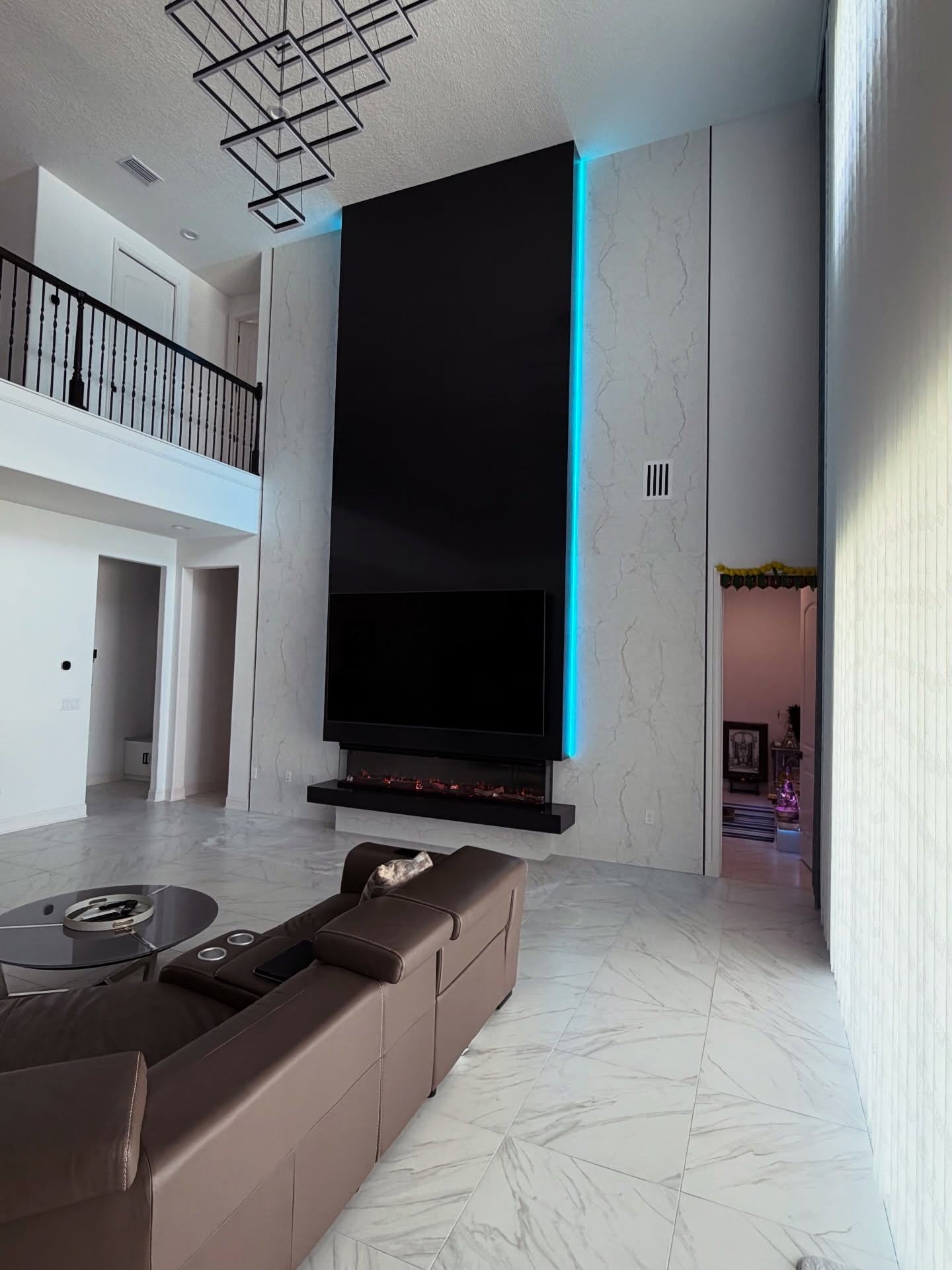 Floating-shelf TV built-in with shaker cabinets by AVP Construction JAX — Jacksonville & St. John's County, FL