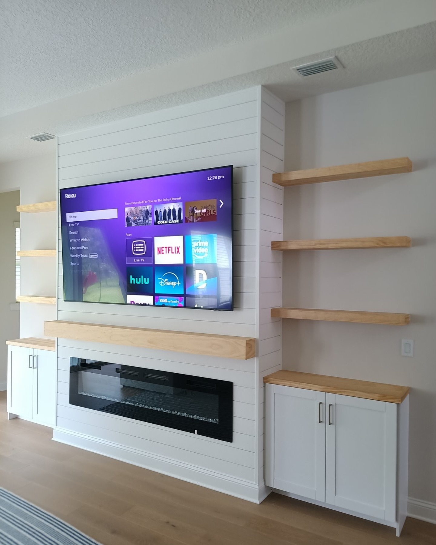 Custom TV entertainment center built-in by AVP Construction JAX — Jacksonville & St. John's County, FL