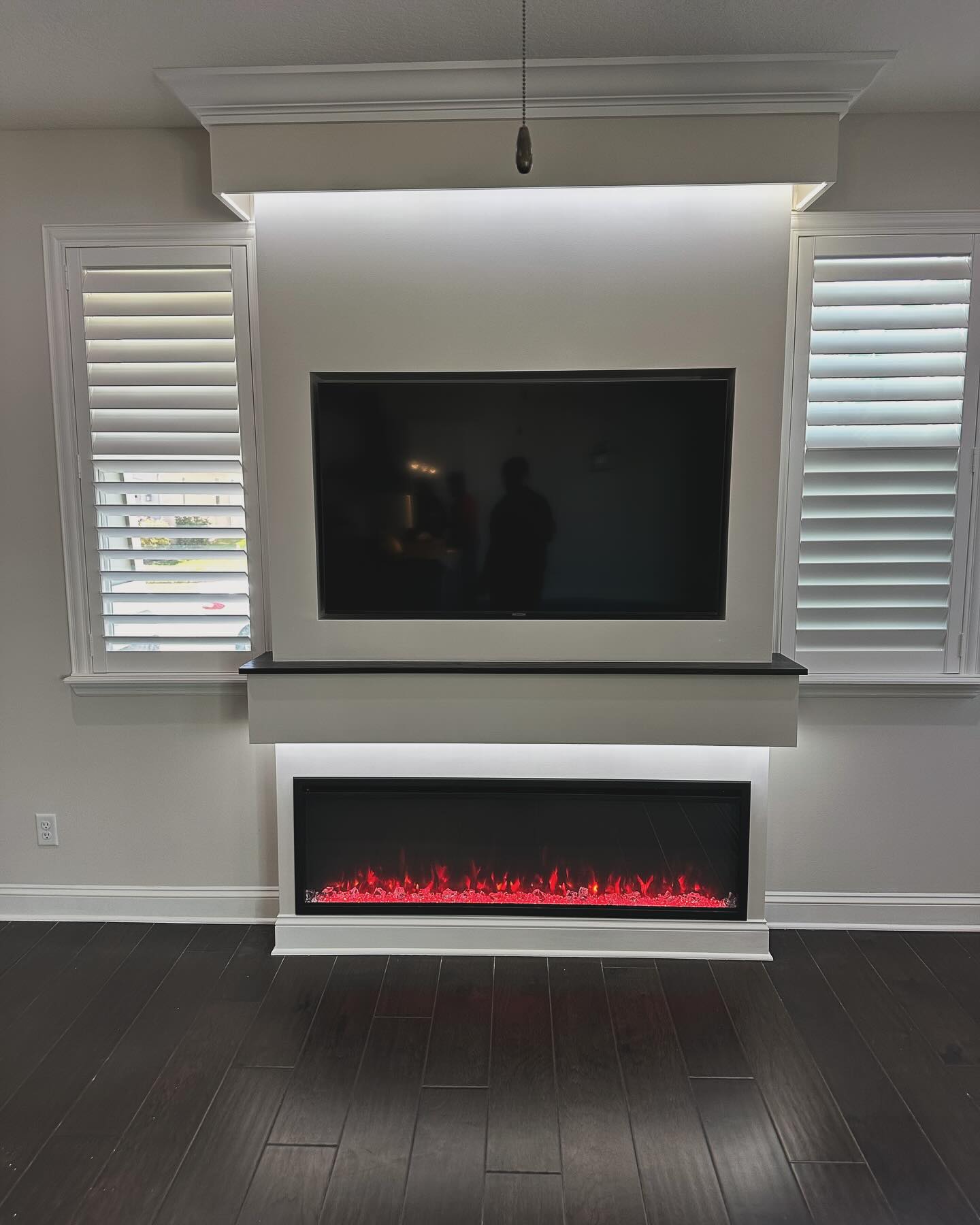 Slat-wall TV feature with hidden wiring by AVP Construction JAX — Jacksonville & St. John's County, FL