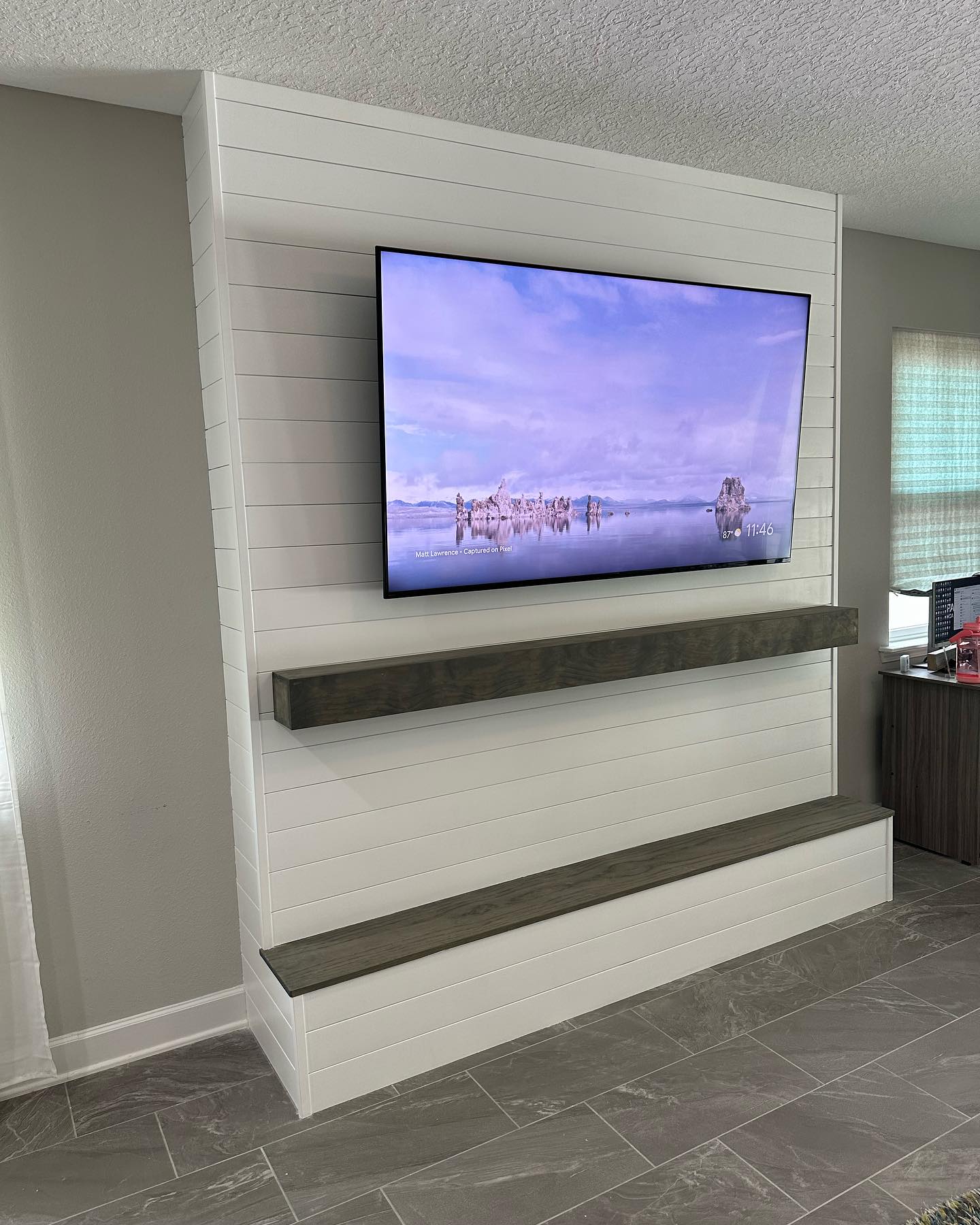 Floating-shelf TV built-in with shaker cabinets by AVP Construction JAX — Jacksonville & St. John's County, FL