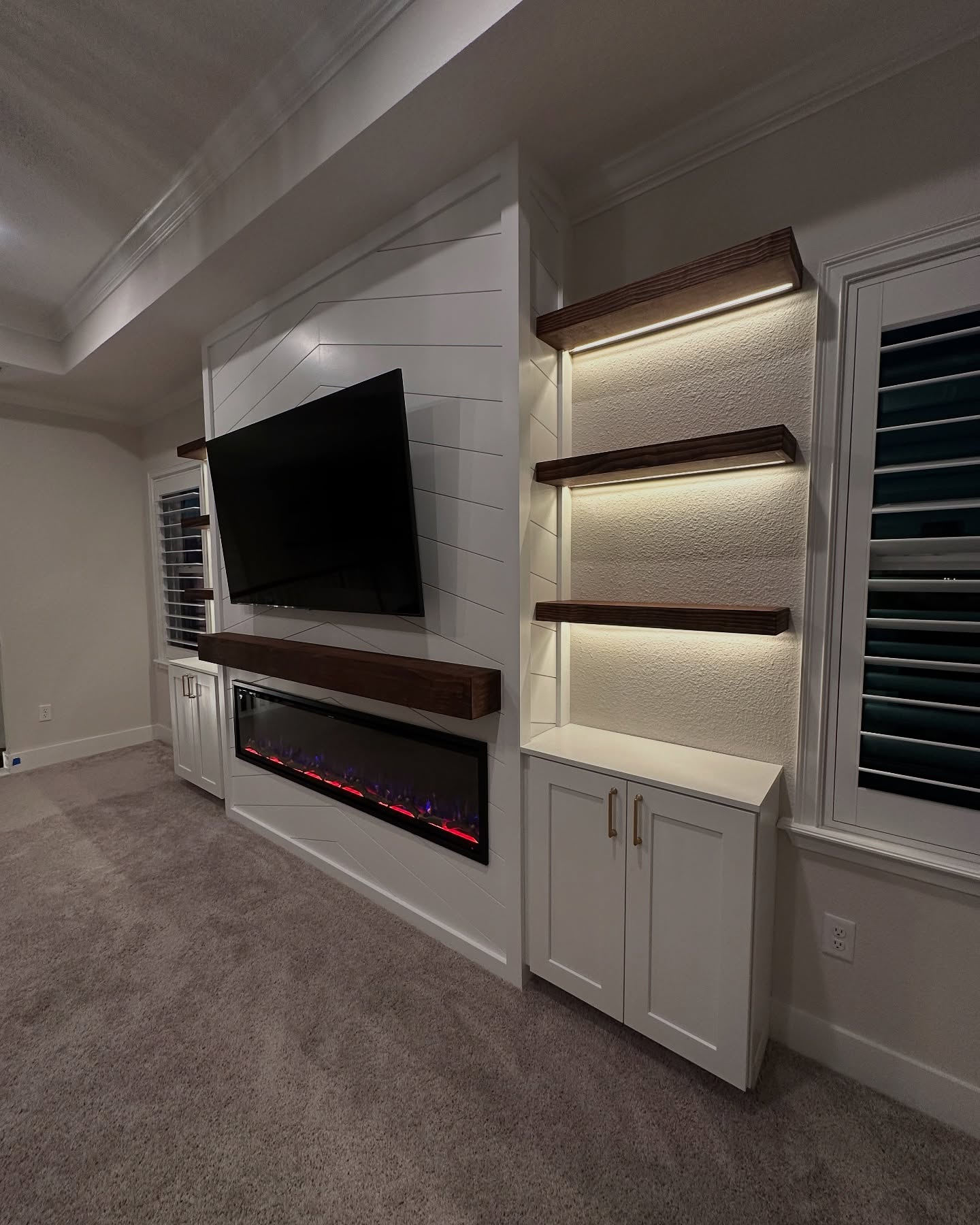 Custom TV entertainment center built-in by AVP Construction JAX — Jacksonville & St. John's County, FL