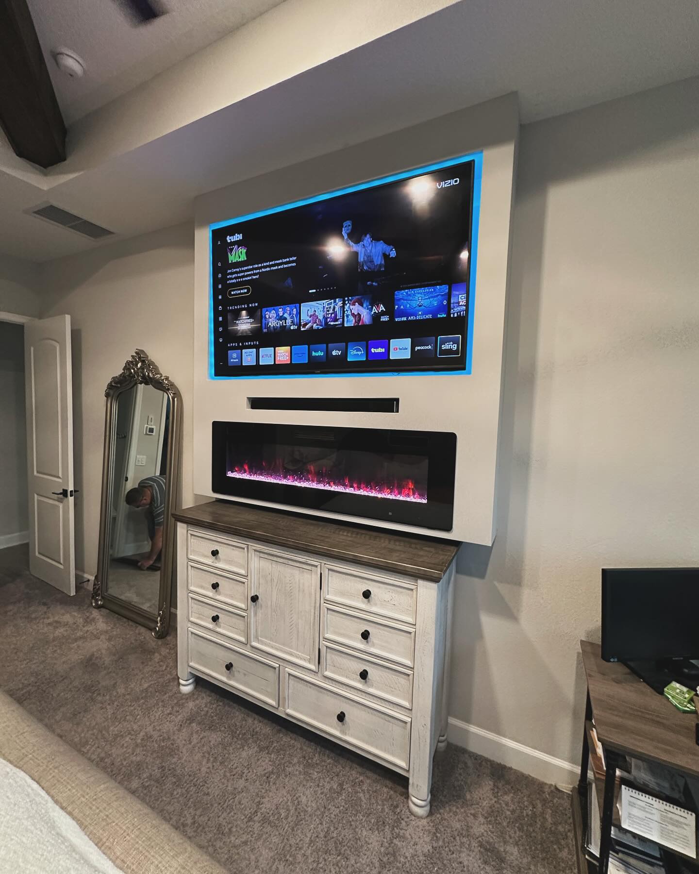 Custom living-room media wall with paneling by AVP Construction JAX — Jacksonville & St. John's County, FL