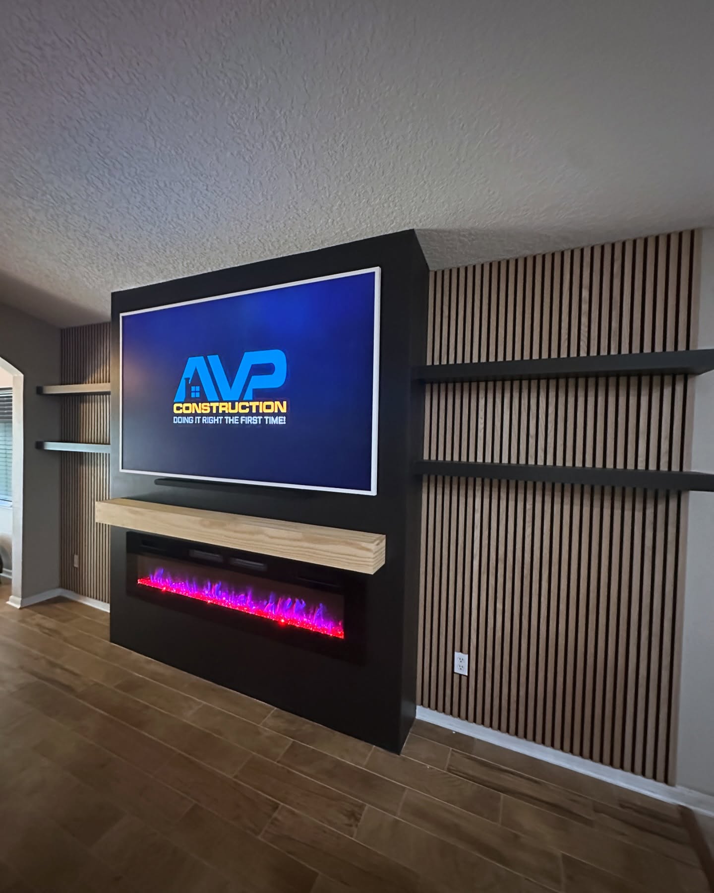 Custom TV entertainment center built-in by AVP Construction JAX — Jacksonville & St. John's County, FL