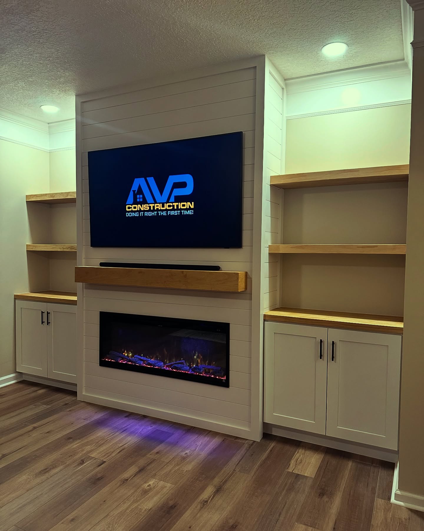 Custom TV entertainment center built-in by AVP Construction JAX — Jacksonville & St. John's County, FL