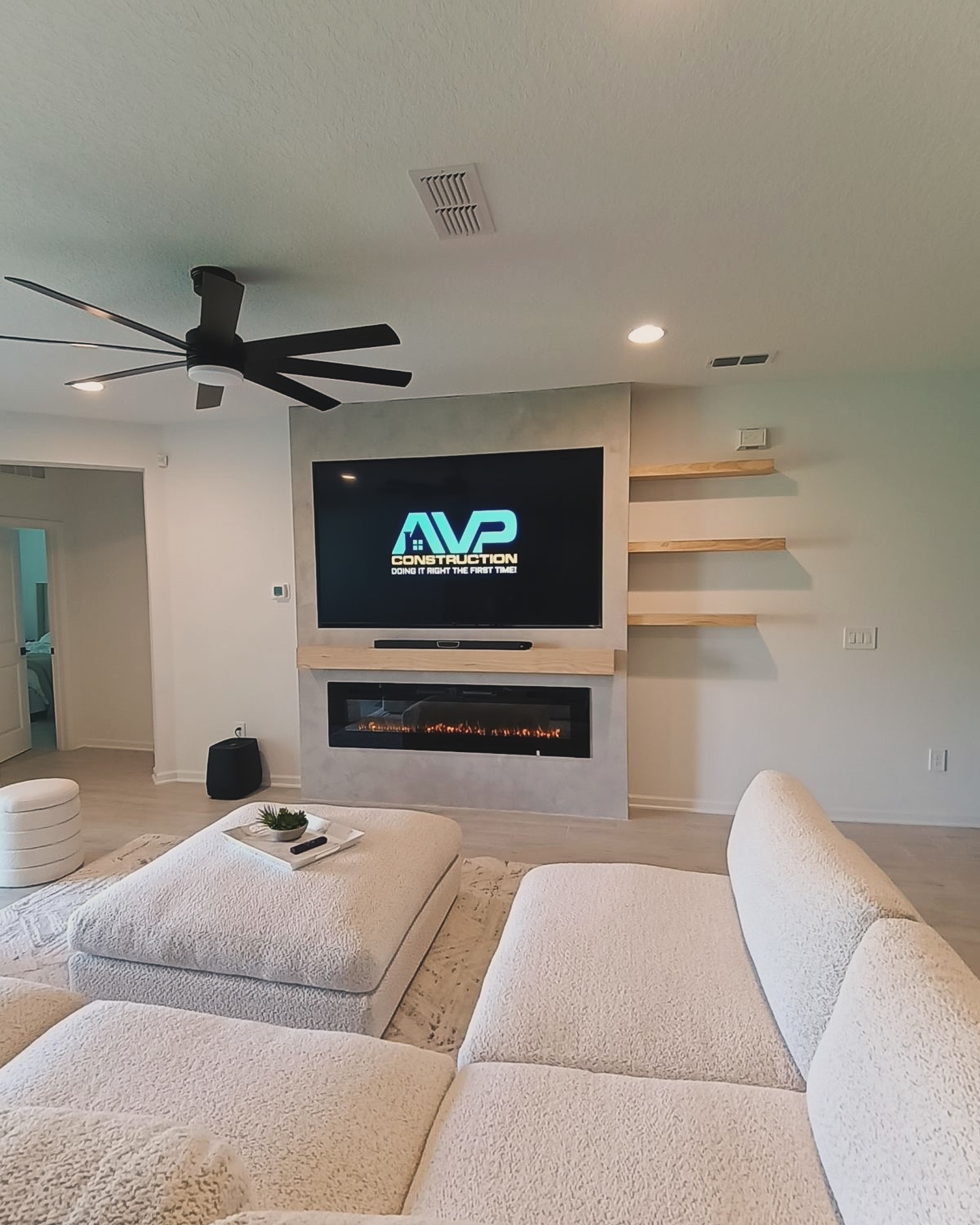 Slat-wall TV feature with hidden wiring by AVP Construction JAX — Jacksonville & St. John's County, FL