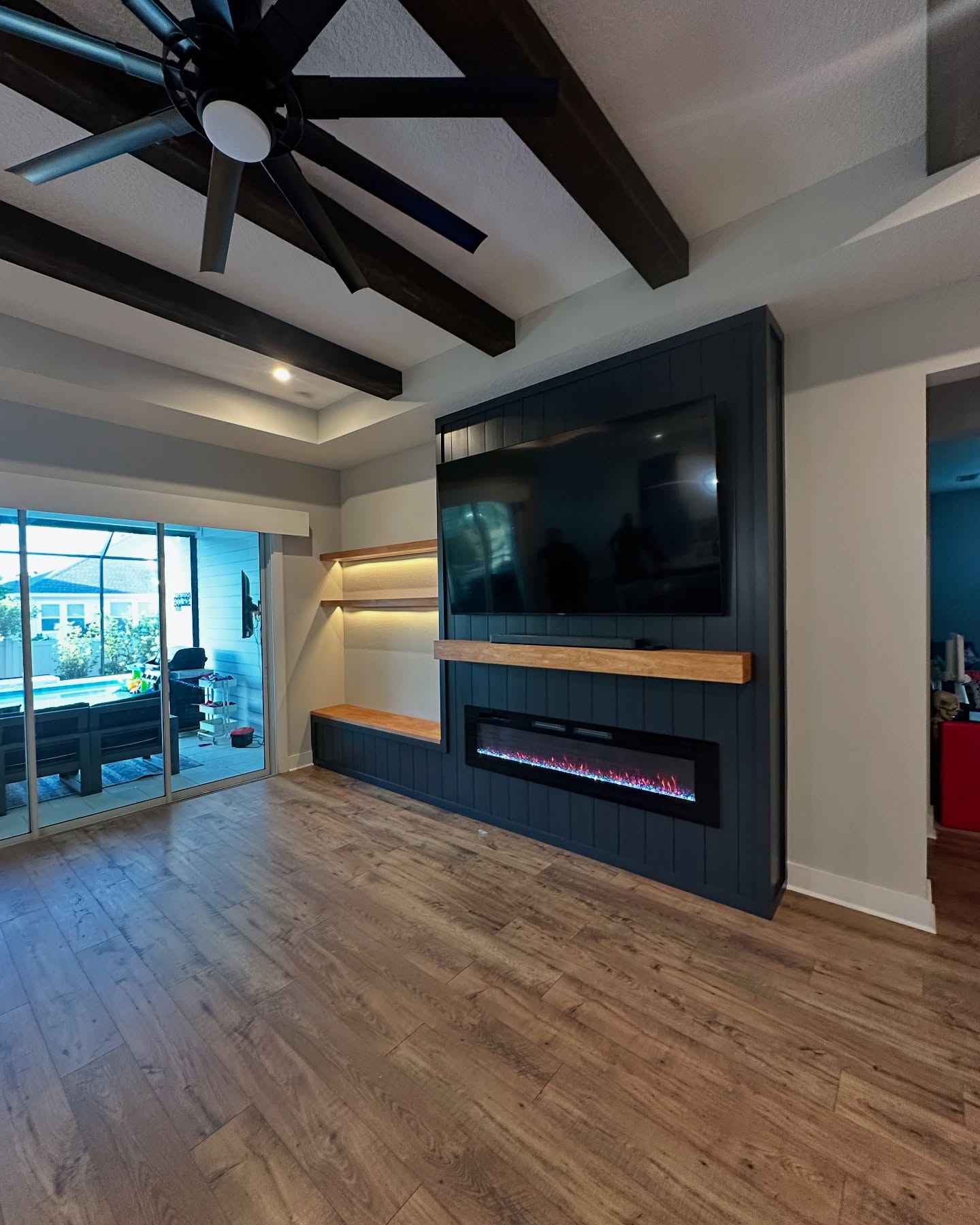 Custom TV entertainment center built-in by AVP Construction JAX — Jacksonville & St. John's County, FL