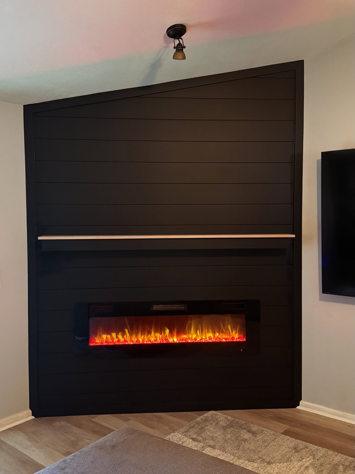 Custom TV entertainment center built-in by AVP Construction JAX — Jacksonville & St. John's County, FL