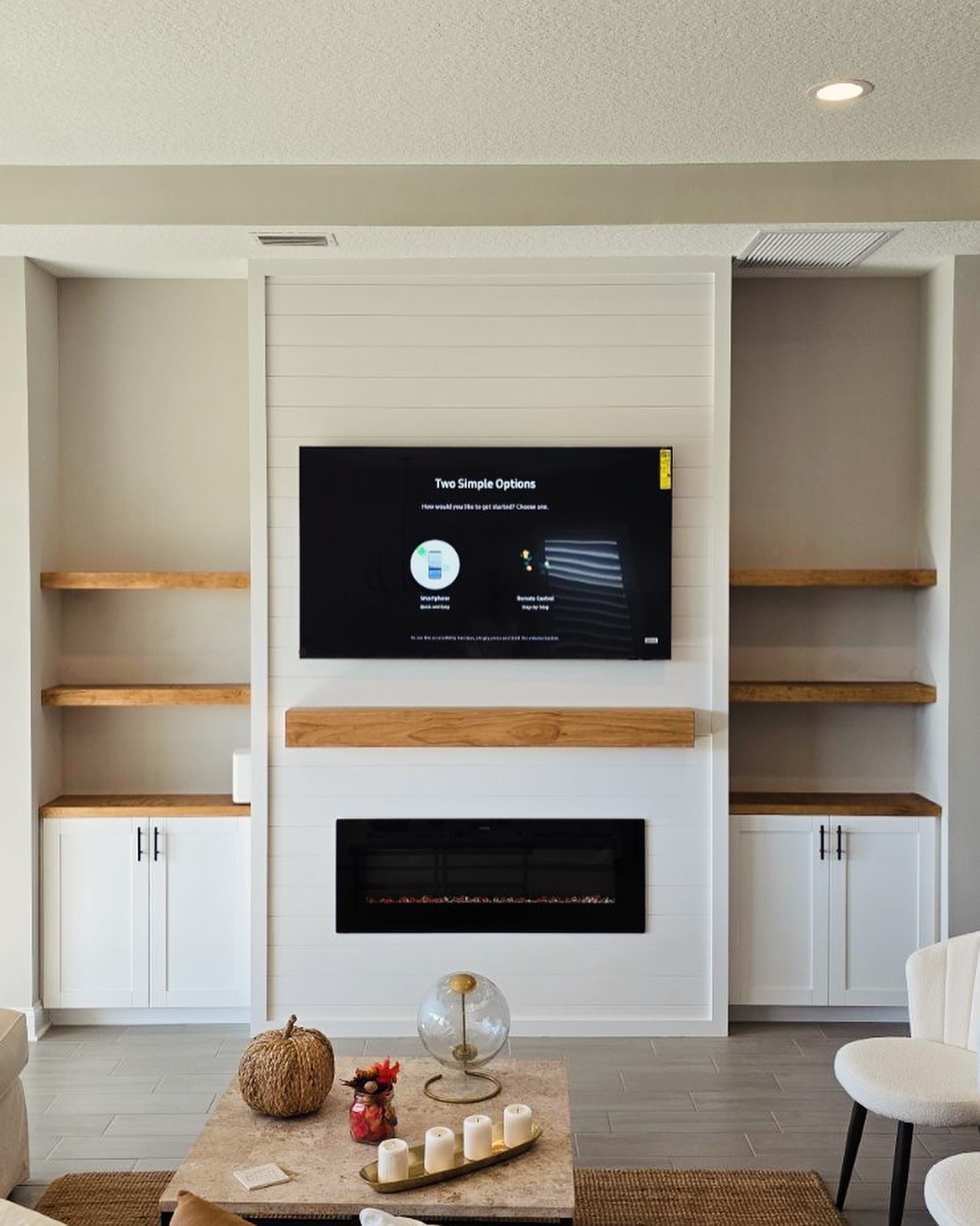 Custom living-room media wall with paneling by AVP Construction JAX — Jacksonville & St. John's County, FL