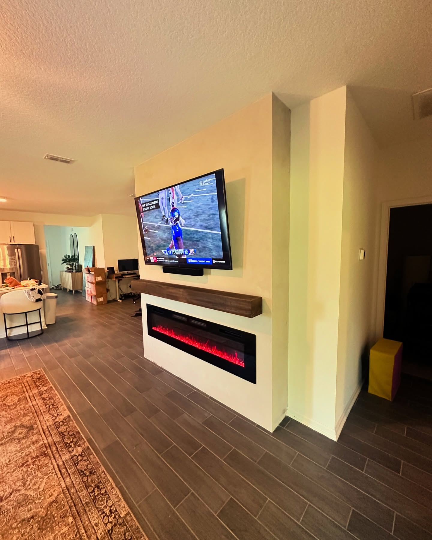Slat-wall TV feature with hidden wiring by AVP Construction JAX — Jacksonville & St. John's County, FL