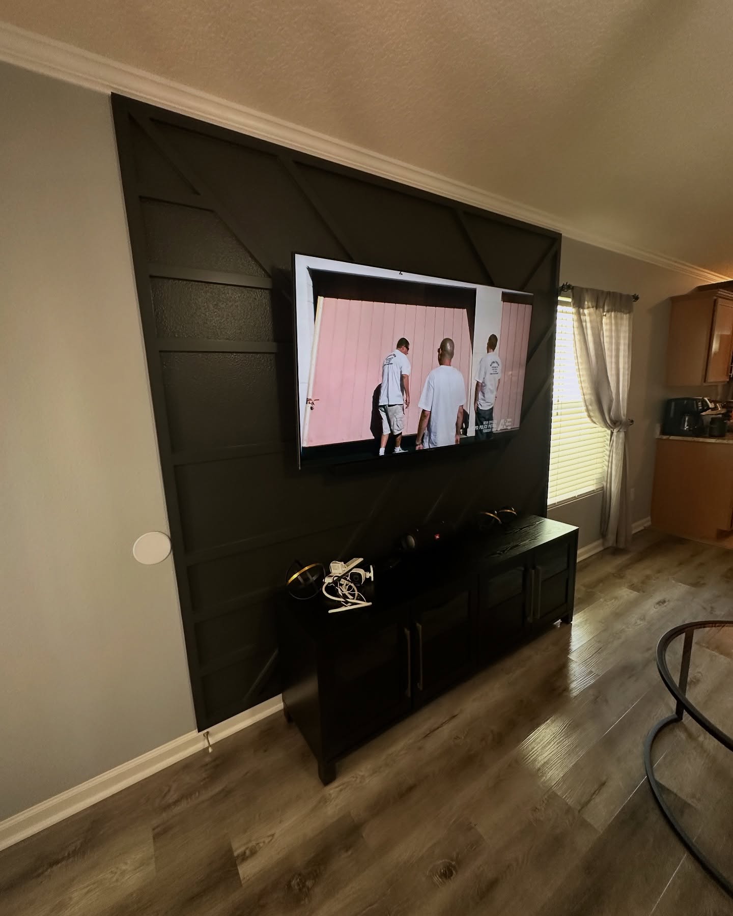 Floating-shelf TV built-in with shaker cabinets by AVP Construction JAX — Jacksonville & St. John's County, FL