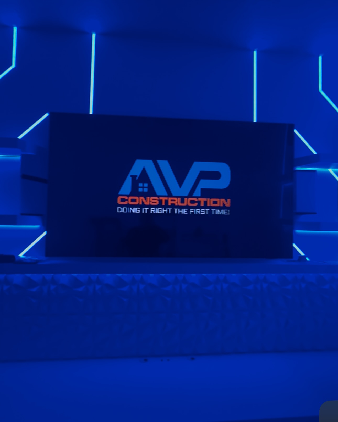 Built-in TV cabinet flanked by display shelving by AVP Construction JAX — Jacksonville & St. John's County, FL