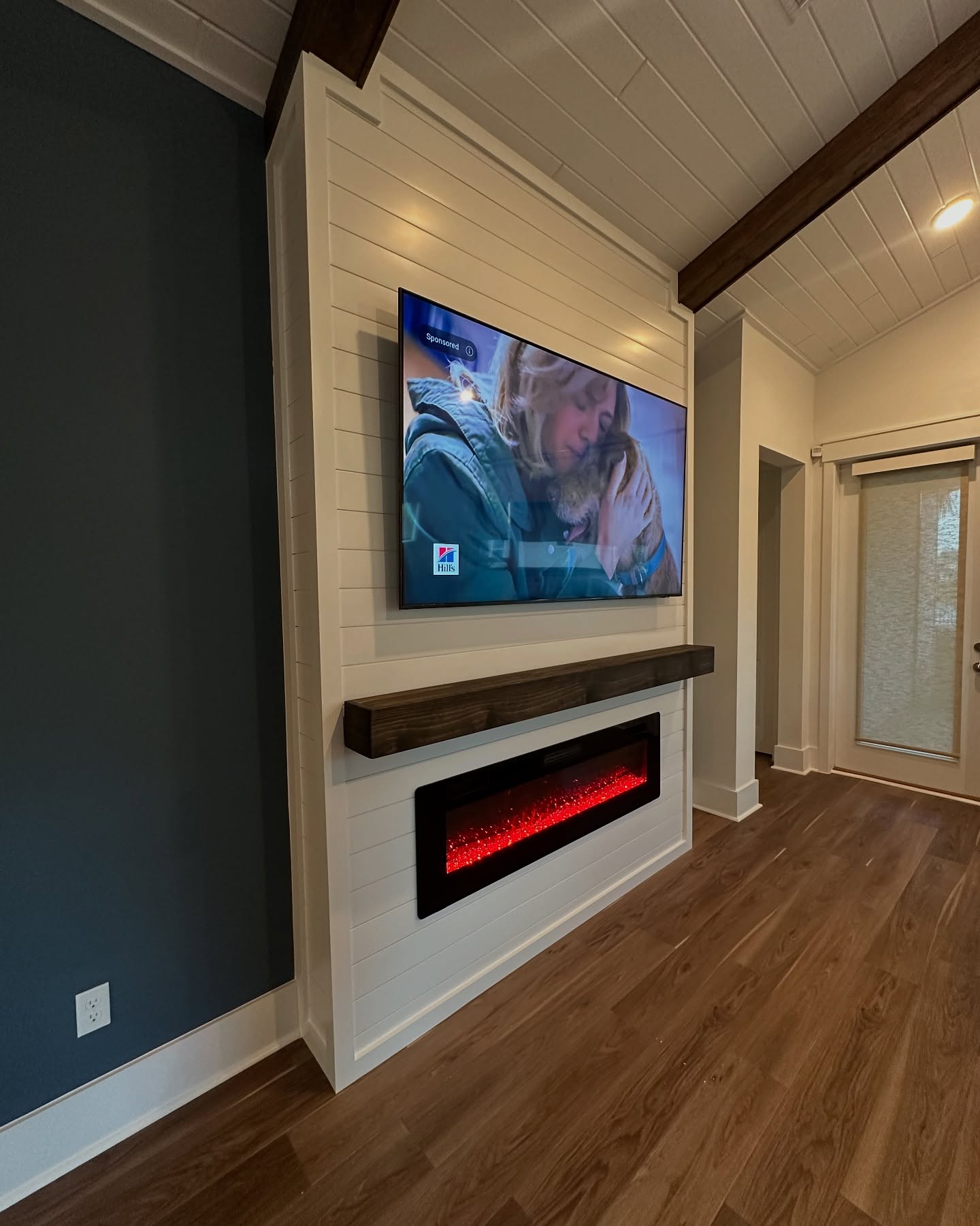 Custom TV entertainment center built-in by AVP Construction JAX — Jacksonville & St. John's County, FL