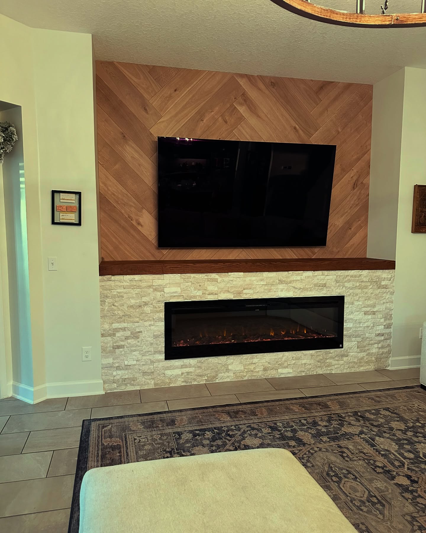 Built-in TV cabinet flanked by display shelving by AVP Construction JAX — Jacksonville & St. John's County, FL