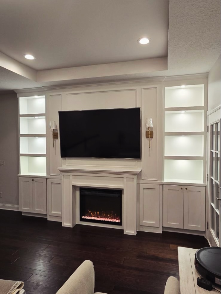 Custom TV entertainment center built-in by AVP Construction JAX — Jacksonville & St. John's County, FL