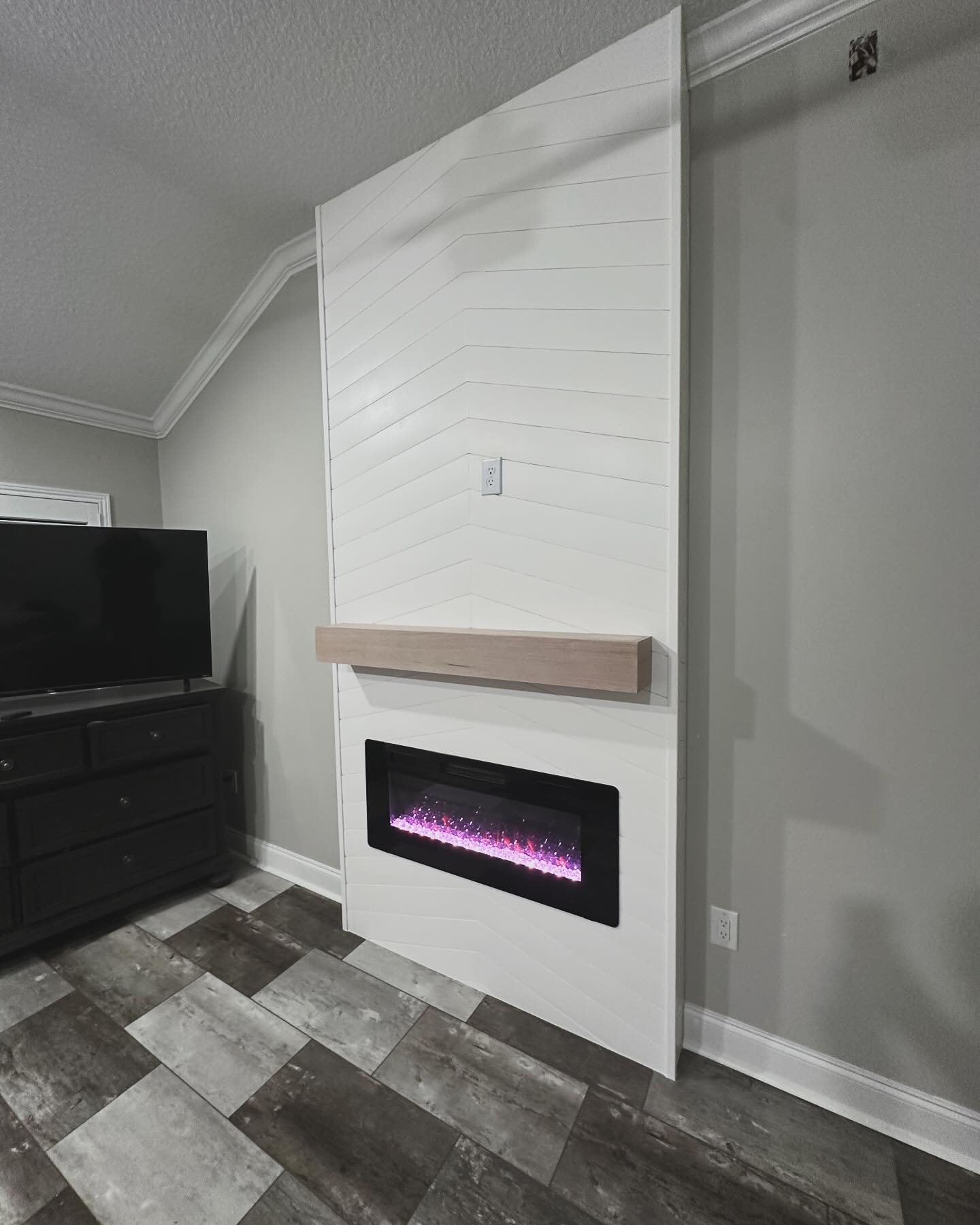 Floating-shelf TV built-in with shaker cabinets by AVP Construction JAX — Jacksonville & St. John's County, FL