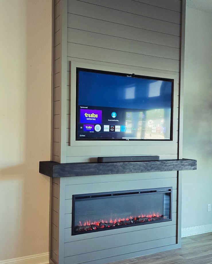 Floating-shelf TV built-in with shaker cabinets by AVP Construction JAX — Jacksonville & St. John's County, FL