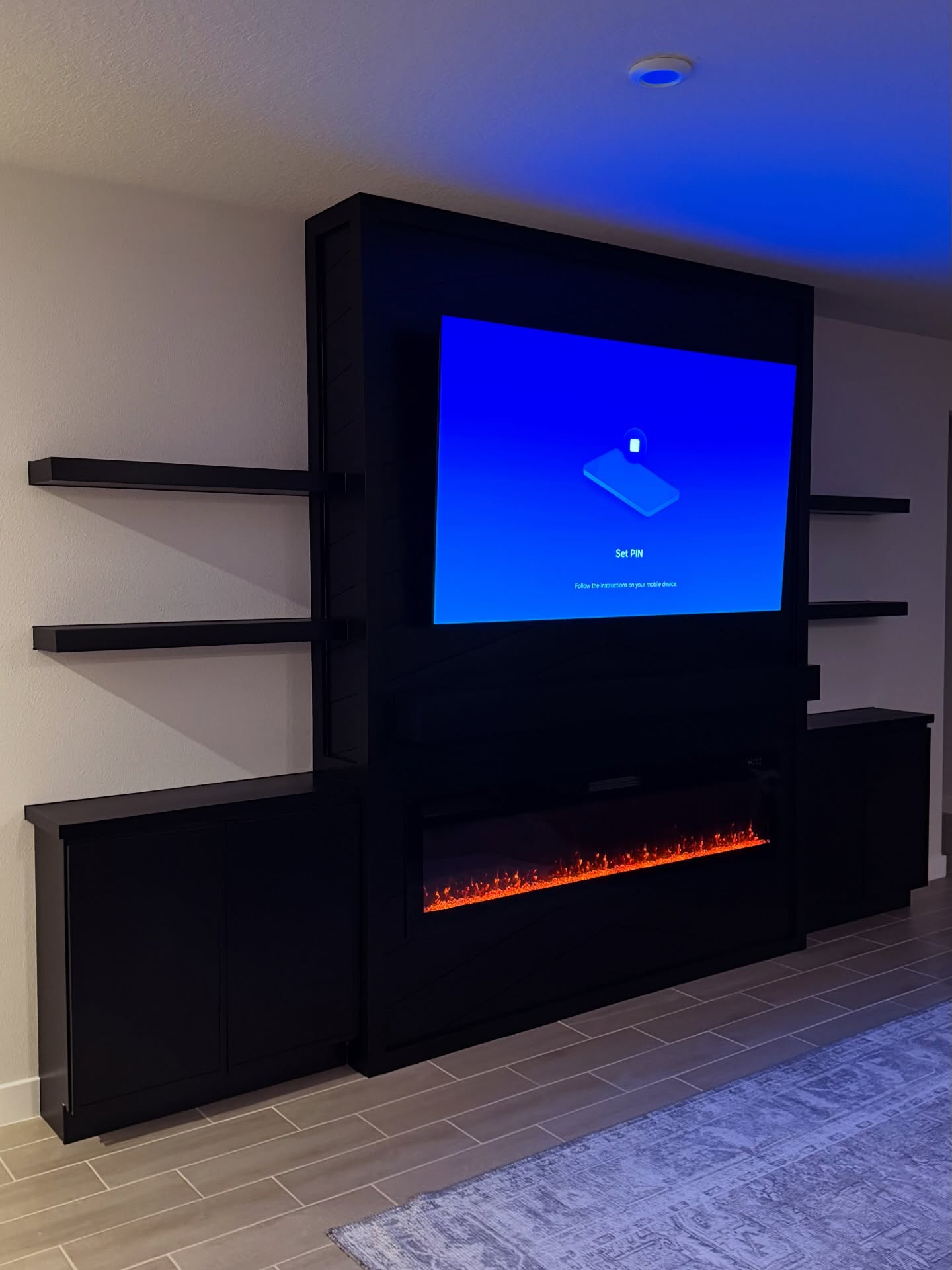 Slat-wall TV feature with hidden wiring by AVP Construction JAX — Jacksonville & St. John's County, FL