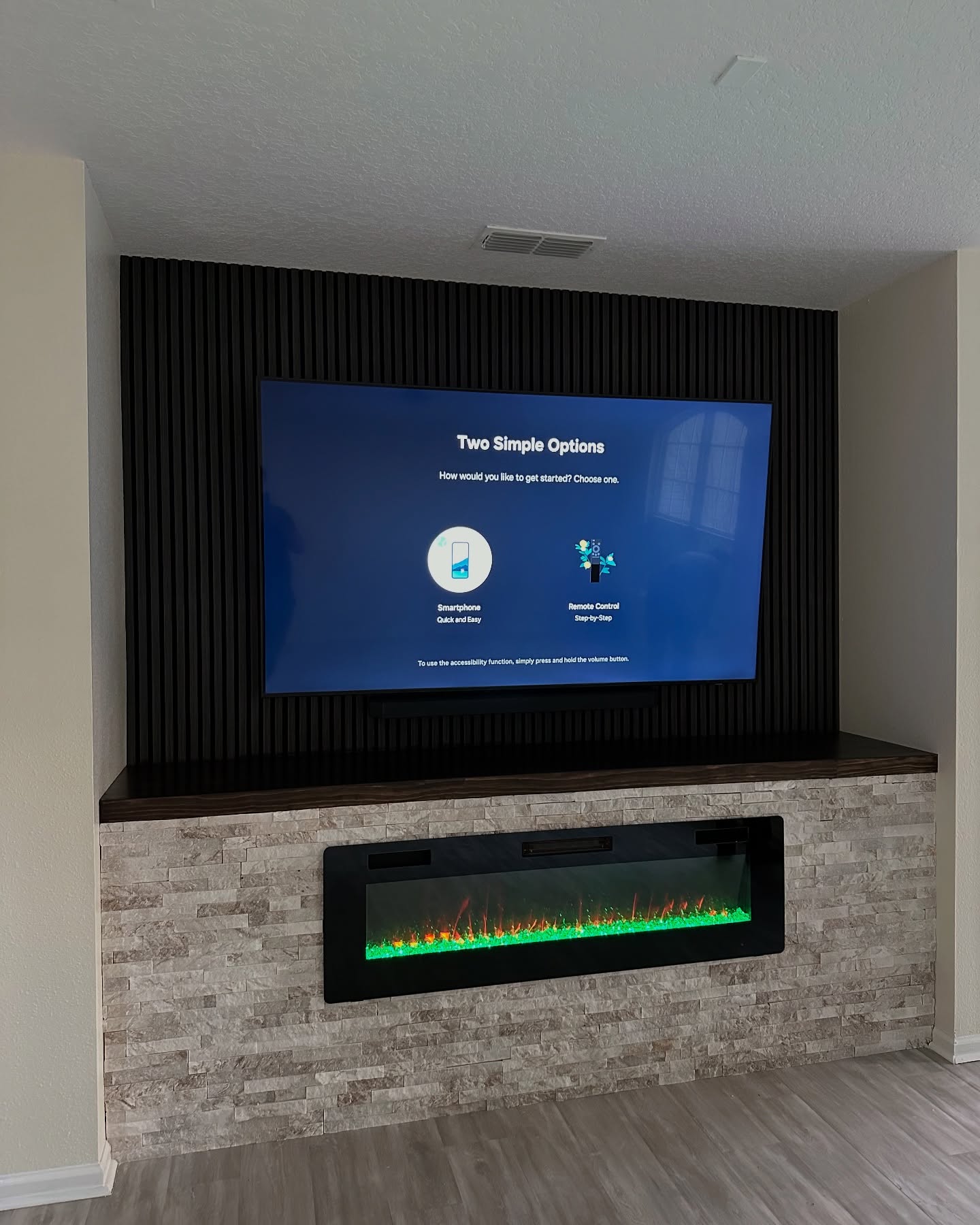 Custom TV entertainment center built-in by AVP Construction JAX — Jacksonville & St. John's County, FL