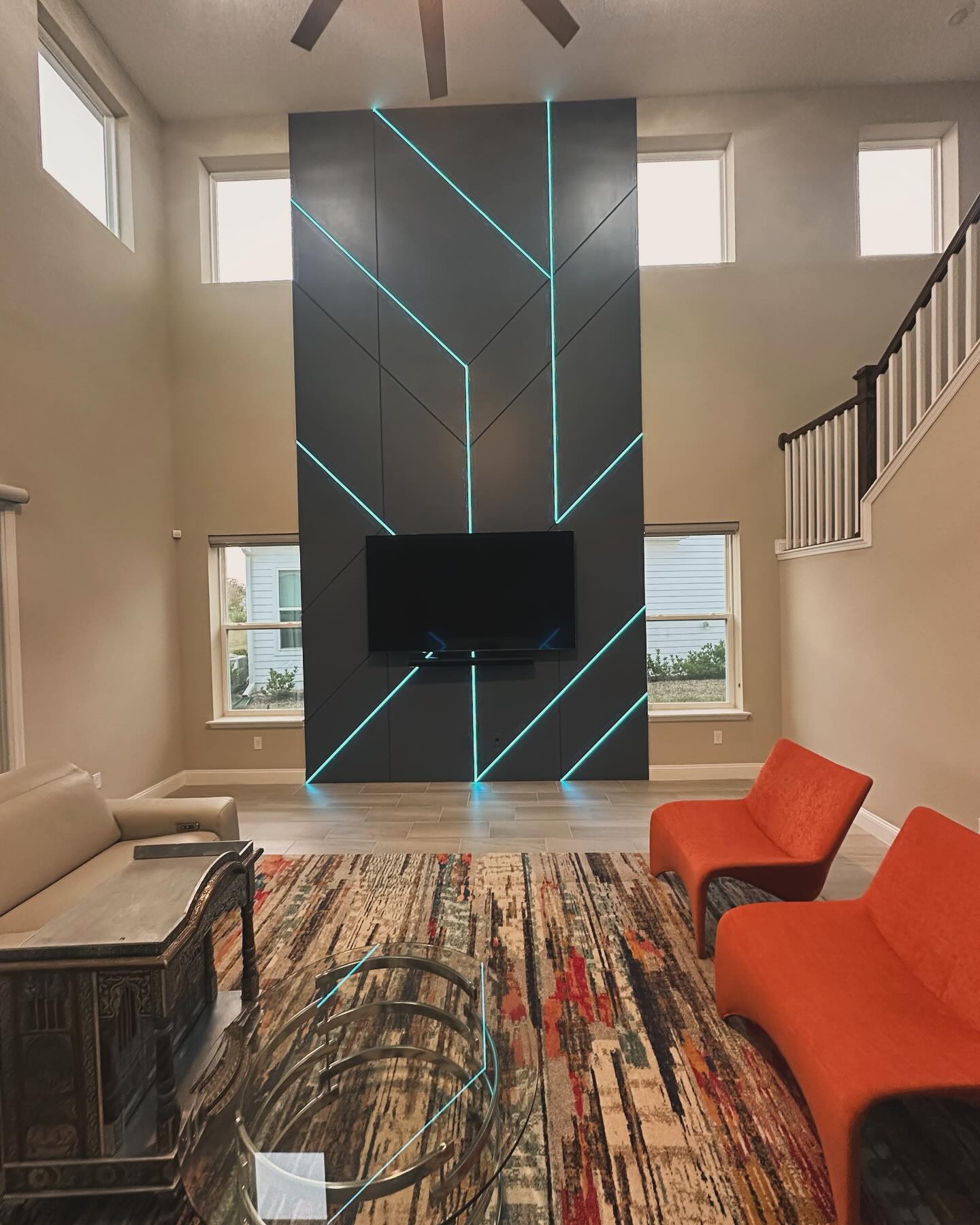 Custom living-room media wall with paneling by AVP Construction JAX — Jacksonville & St. John's County, FL