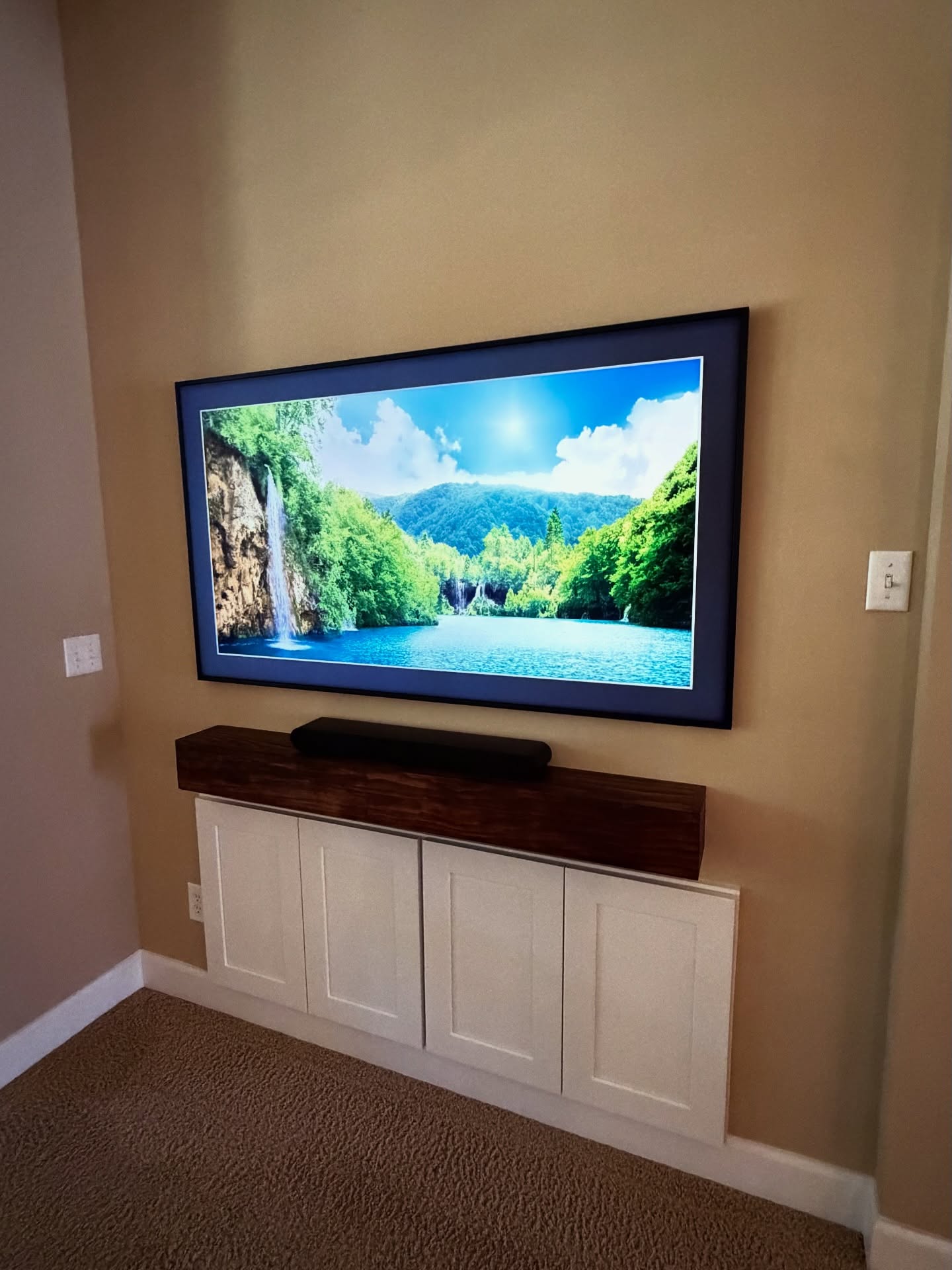 Slat-wall TV feature with hidden wiring by AVP Construction JAX — Jacksonville & St. John's County, FL