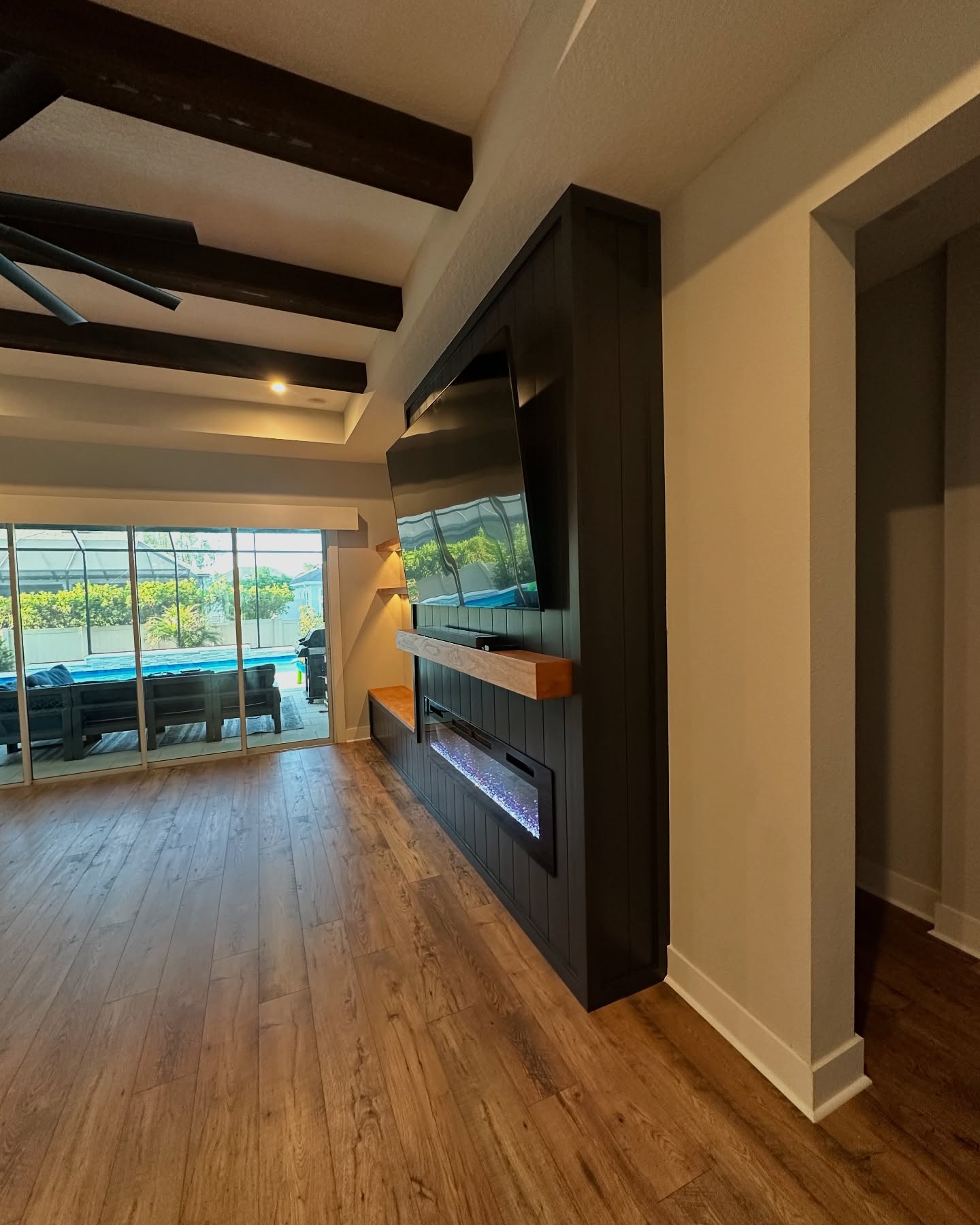 Custom TV entertainment center built-in by AVP Construction JAX — Jacksonville & St. John's County, FL