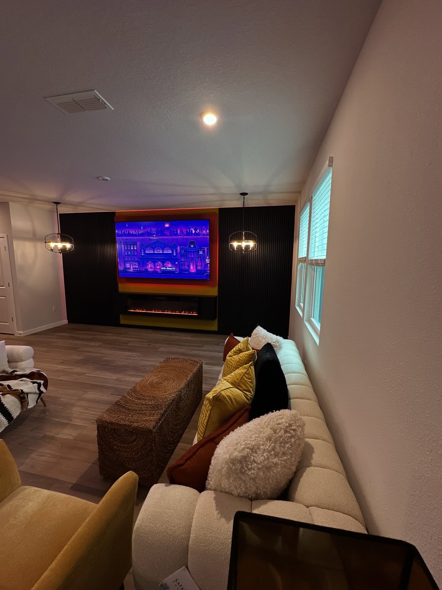 Built-in TV cabinet flanked by display shelving by AVP Construction JAX — Jacksonville & St. John's County, FL