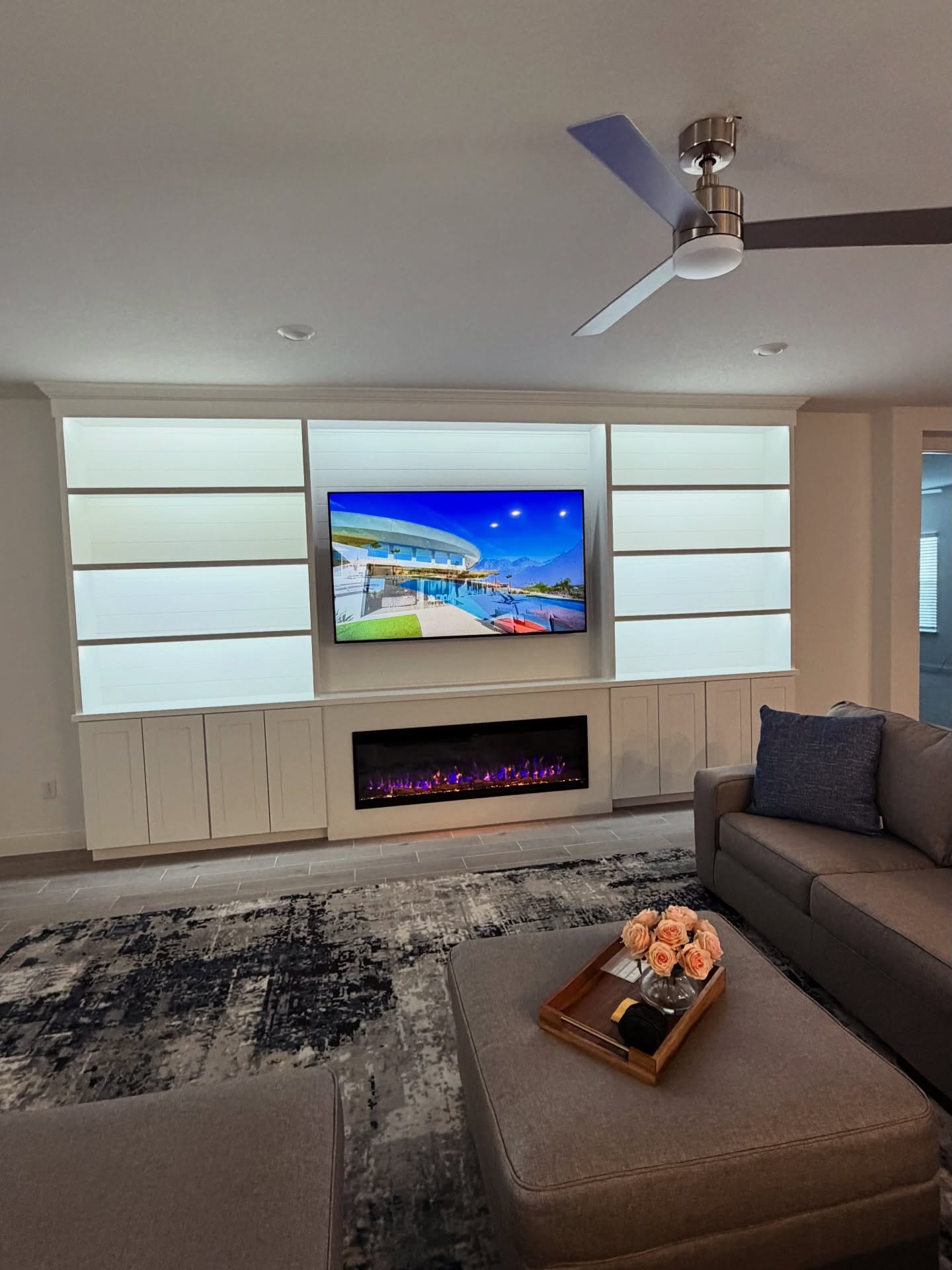 Slat-wall TV feature with hidden wiring by AVP Construction JAX — Jacksonville & St. John's County, FL