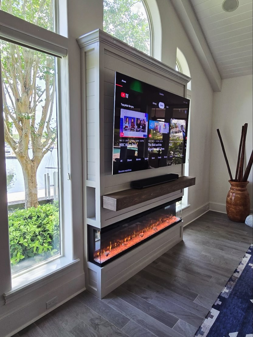 Custom TV entertainment center built-in by AVP Construction JAX — Jacksonville & St. John's County, FL
