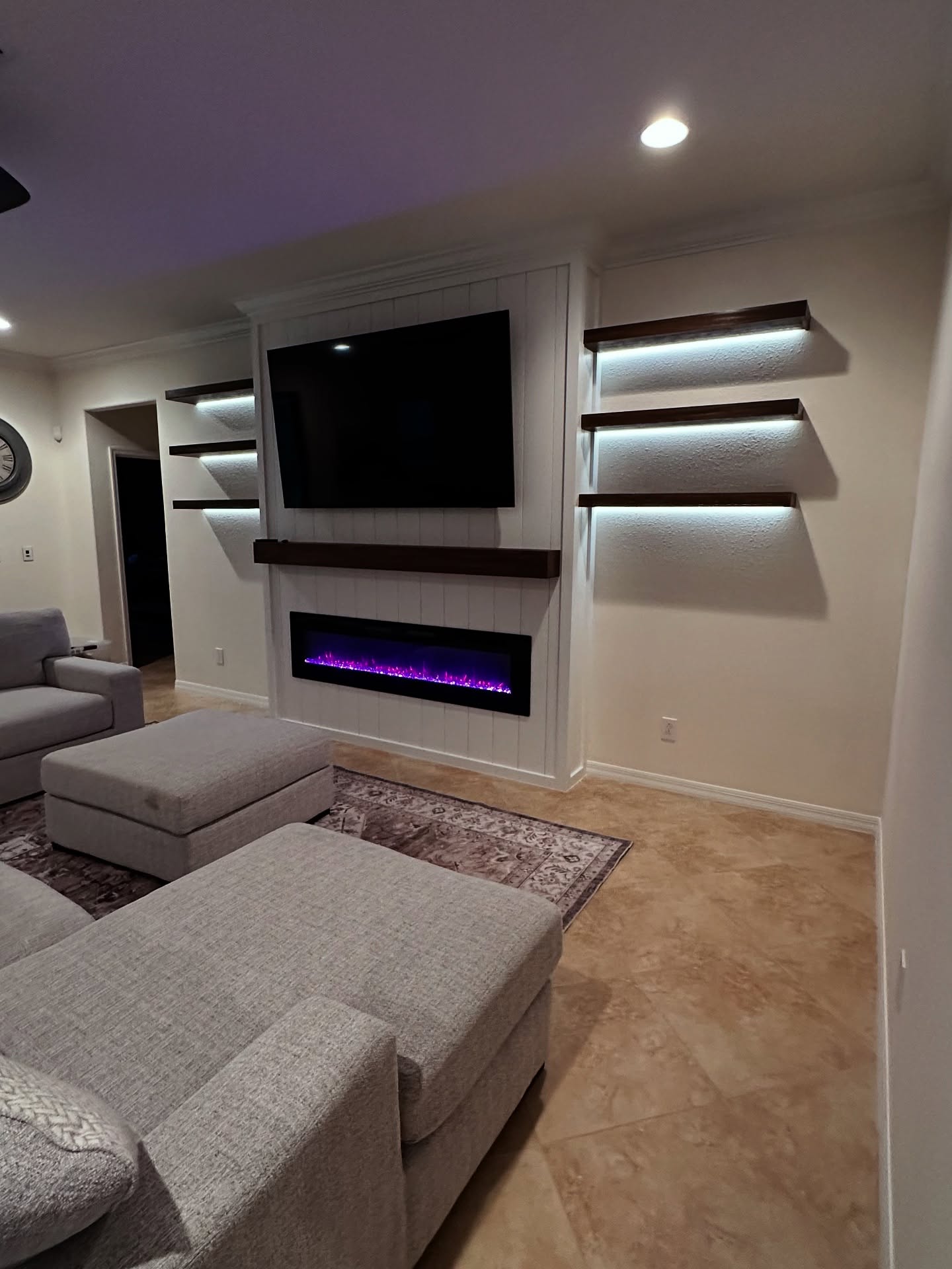 Floating-shelf TV built-in with shaker cabinets by AVP Construction JAX — Jacksonville & St. John's County, FL