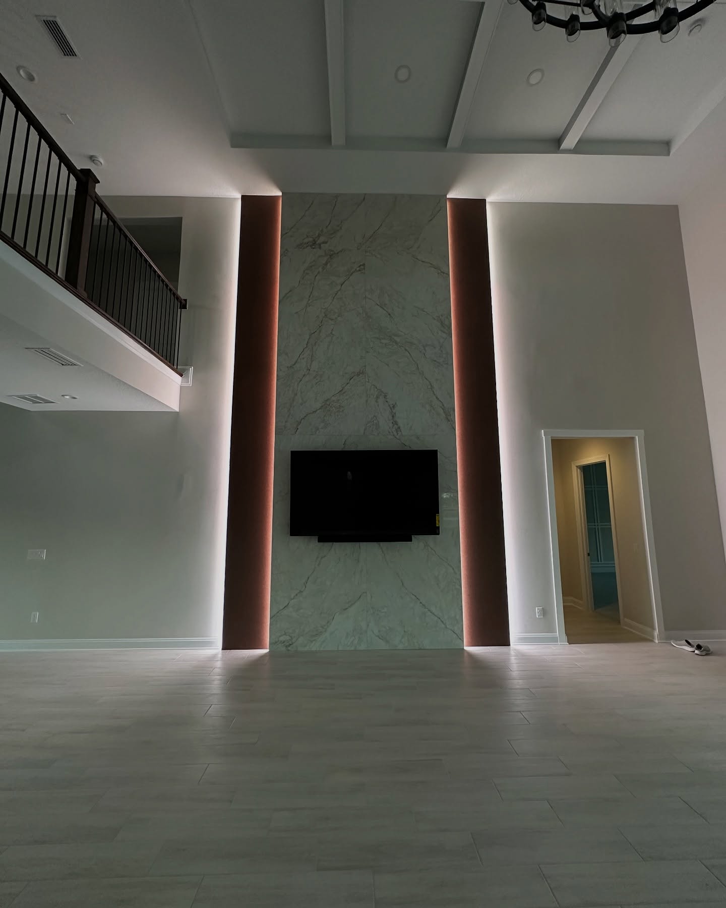 Slat-wall TV feature with hidden wiring by AVP Construction JAX — Jacksonville & St. John's County, FL