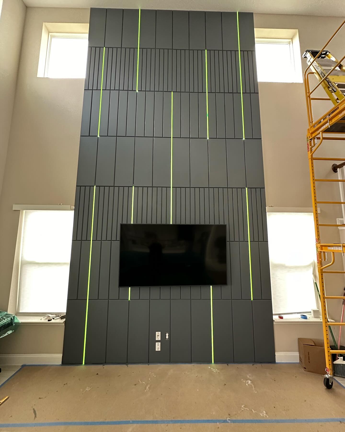 Floating-shelf TV built-in with shaker cabinets by AVP Construction JAX — Jacksonville & St. John's County, FL