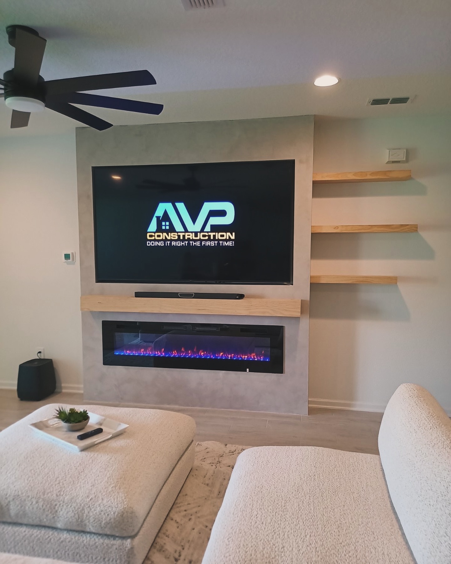 Floor-to-ceiling media wall with custom millwork by AVP Construction JAX — Jacksonville & St. John's County, FL