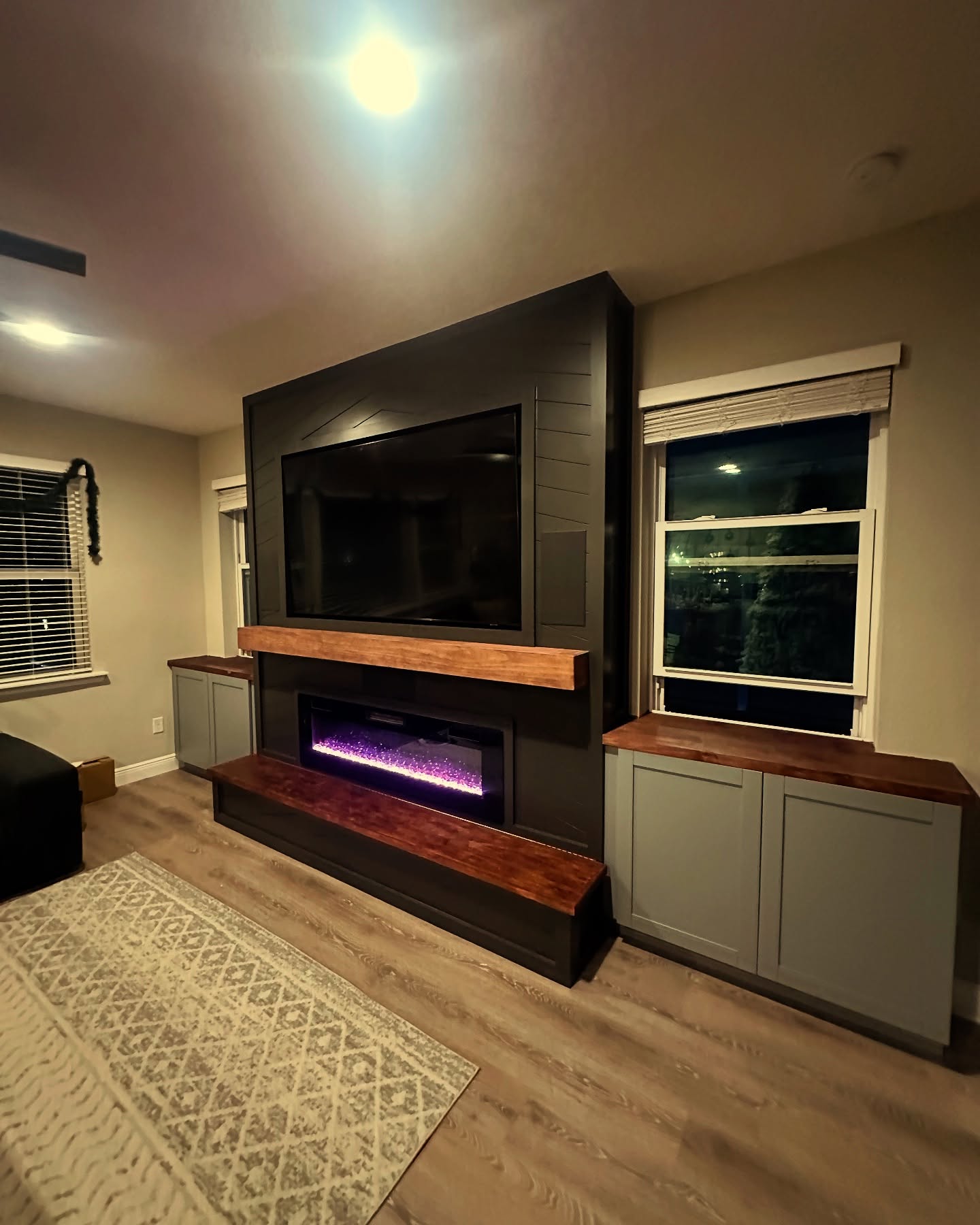 Slat-wall TV feature with hidden wiring by AVP Construction JAX — Jacksonville & St. John's County, FL