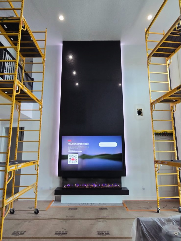Floating-shelf TV built-in with shaker cabinets by AVP Construction JAX — Jacksonville & St. John's County, FL