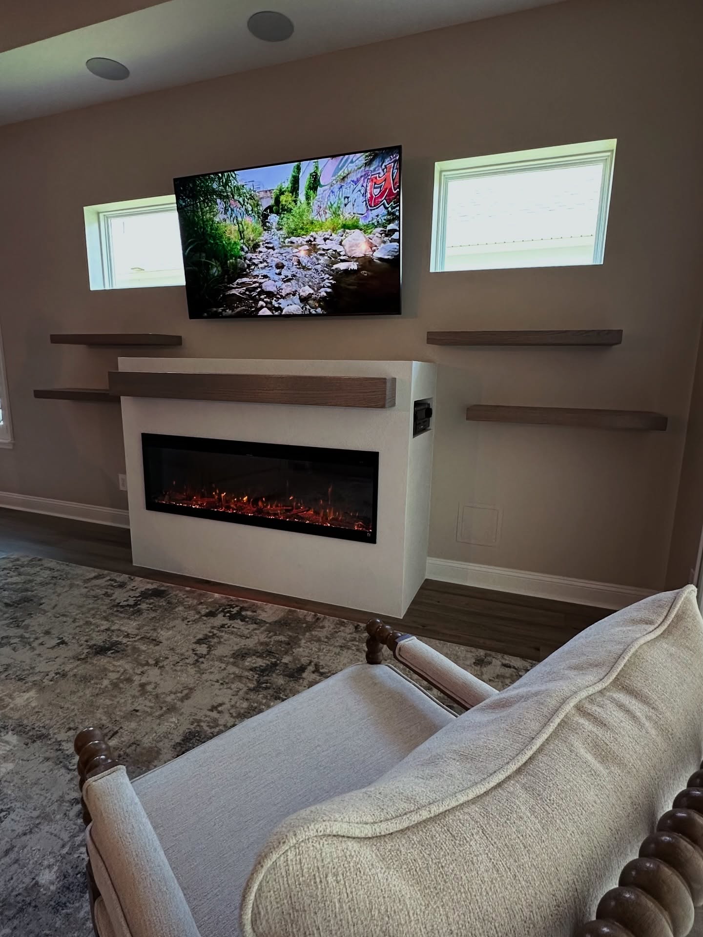 Floor-to-ceiling media wall with custom millwork by AVP Construction JAX — Jacksonville & St. John's County, FL