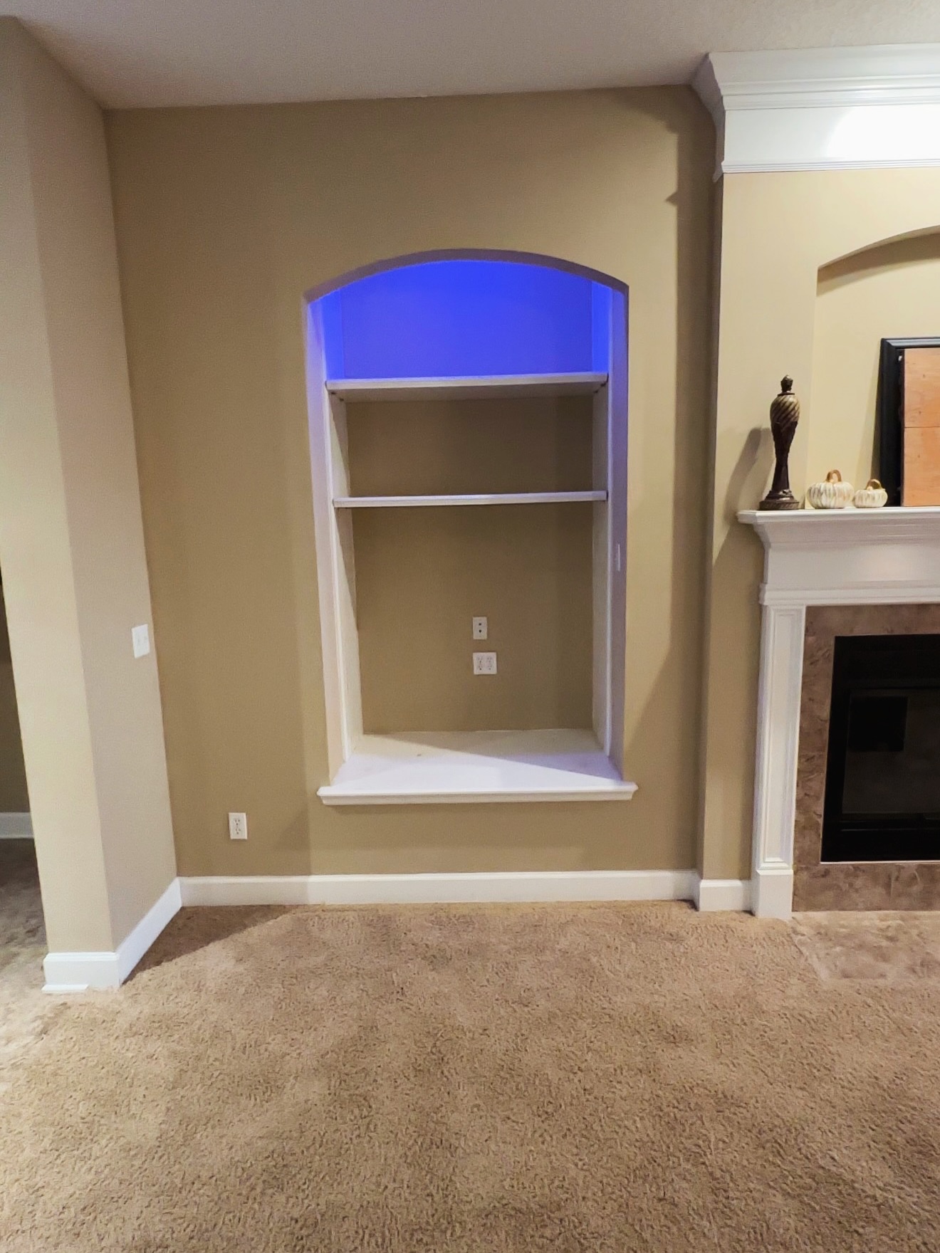 Floating-shelf TV built-in with shaker cabinets by AVP Construction JAX — Jacksonville & St. John's County, FL