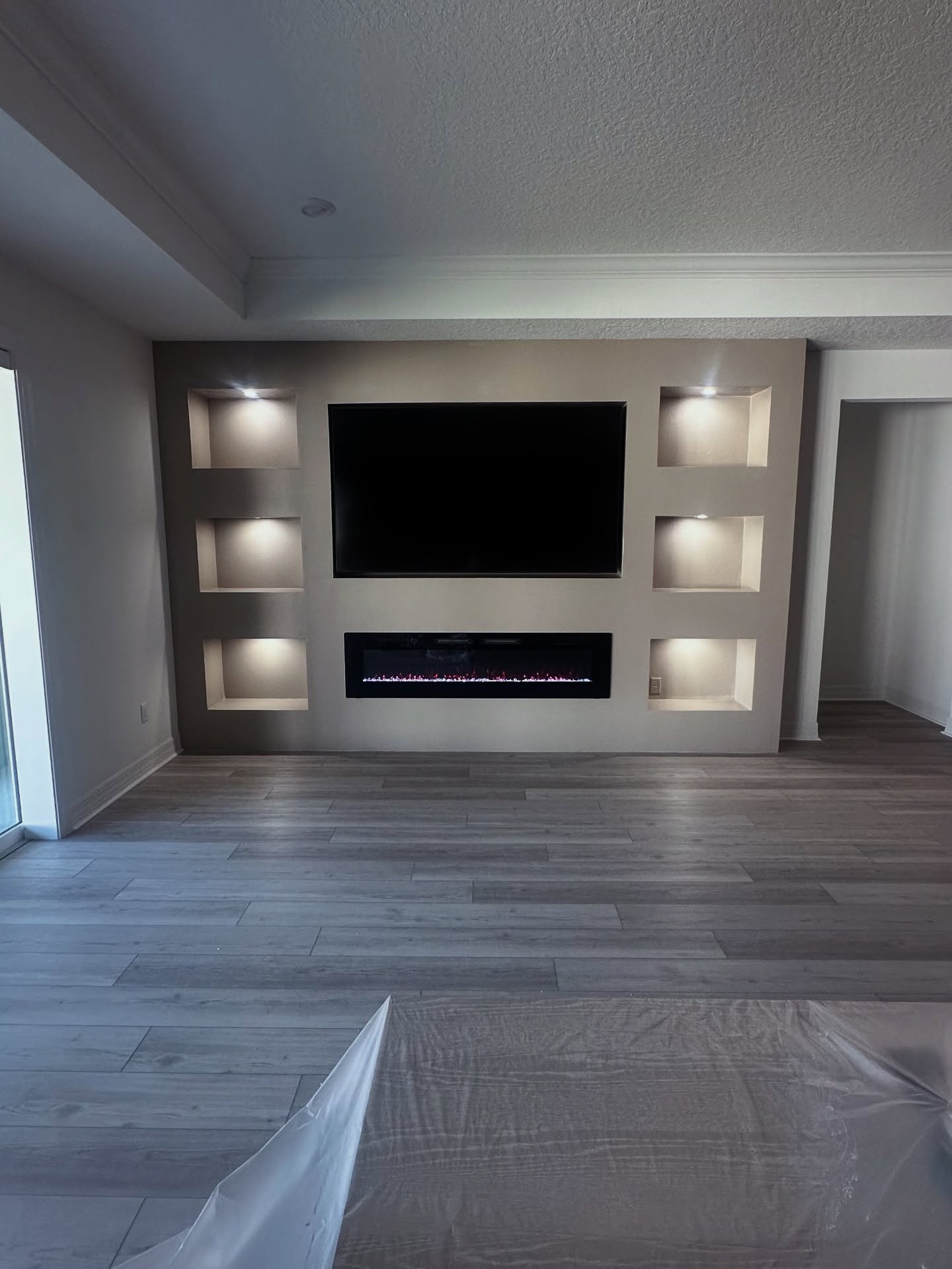 Custom TV entertainment center built-in by AVP Construction JAX — Jacksonville & St. John's County, FL