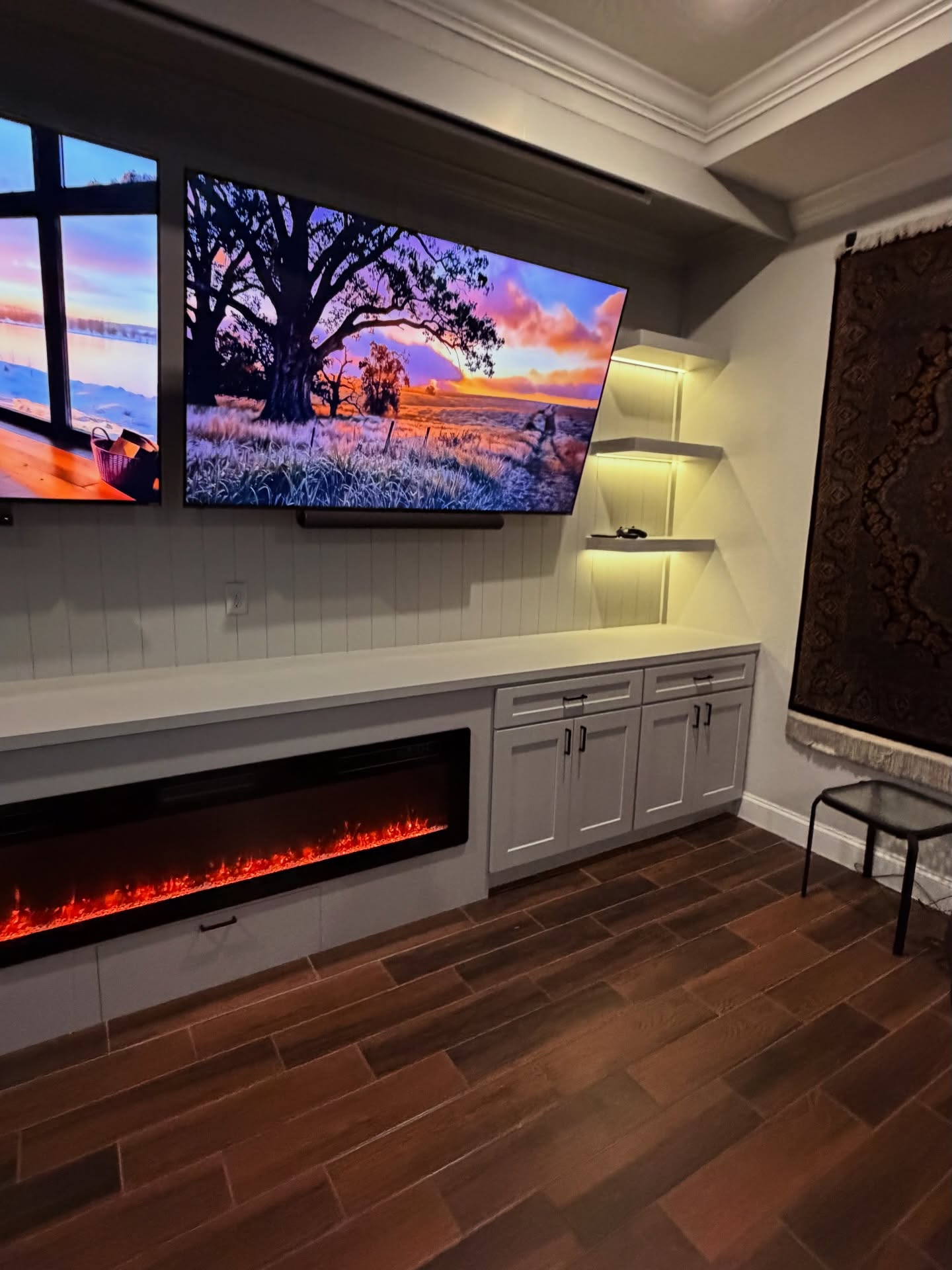 Floor-to-ceiling media wall with custom millwork by AVP Construction JAX — Jacksonville & St. John's County, FL