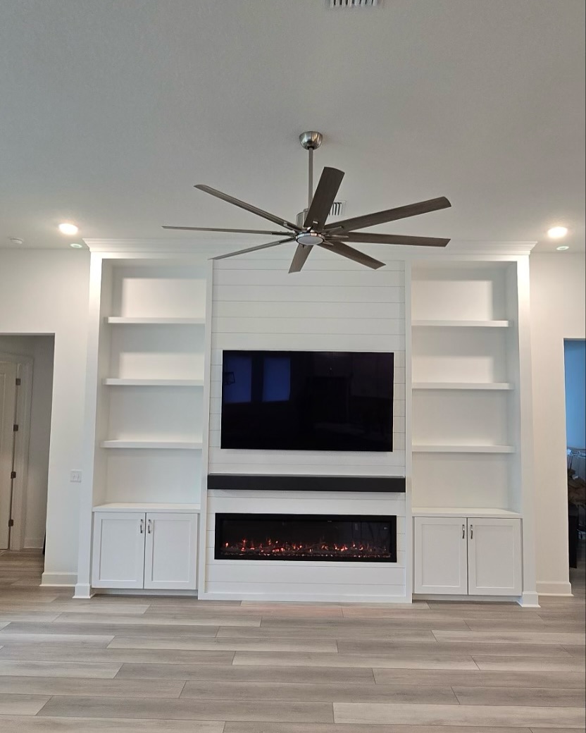 Slat-wall TV feature with hidden wiring by AVP Construction JAX — Jacksonville & St. John's County, FL