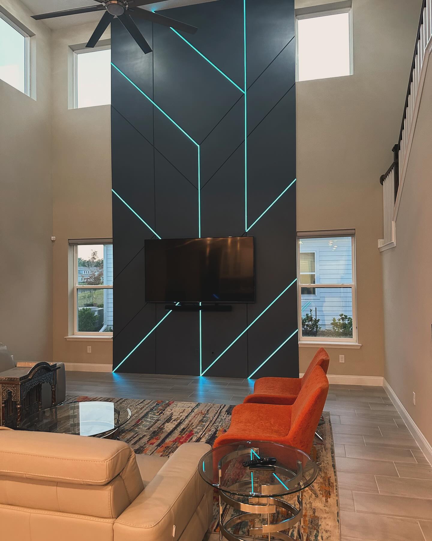 Floor-to-ceiling media wall with custom millwork by AVP Construction JAX — Jacksonville & St. John's County, FL