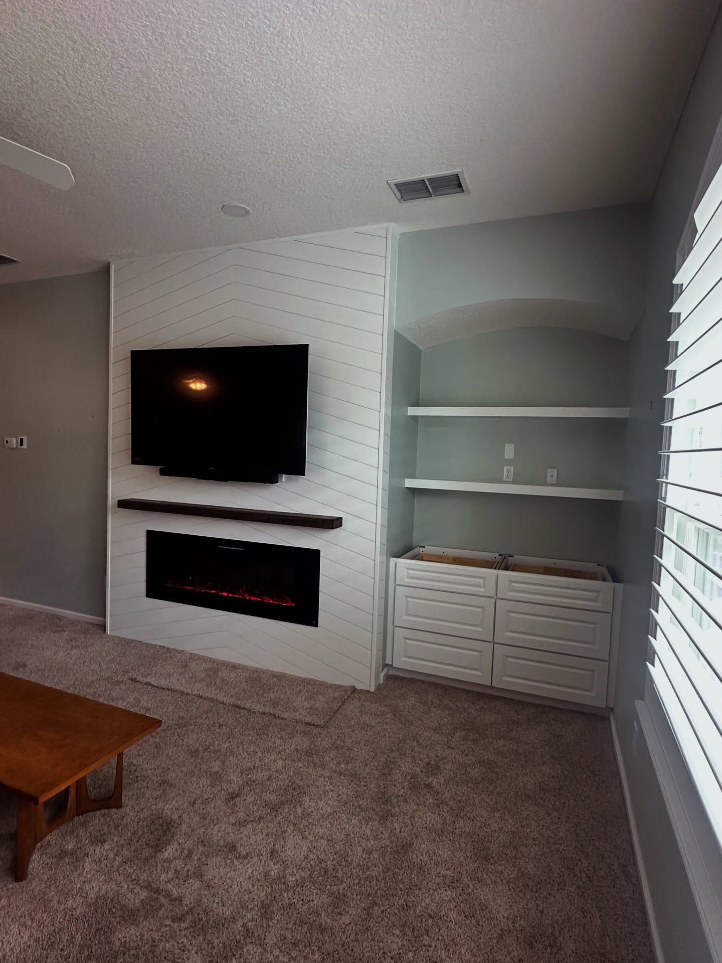 Custom TV entertainment center built-in by AVP Construction JAX — Jacksonville & St. John's County, FL